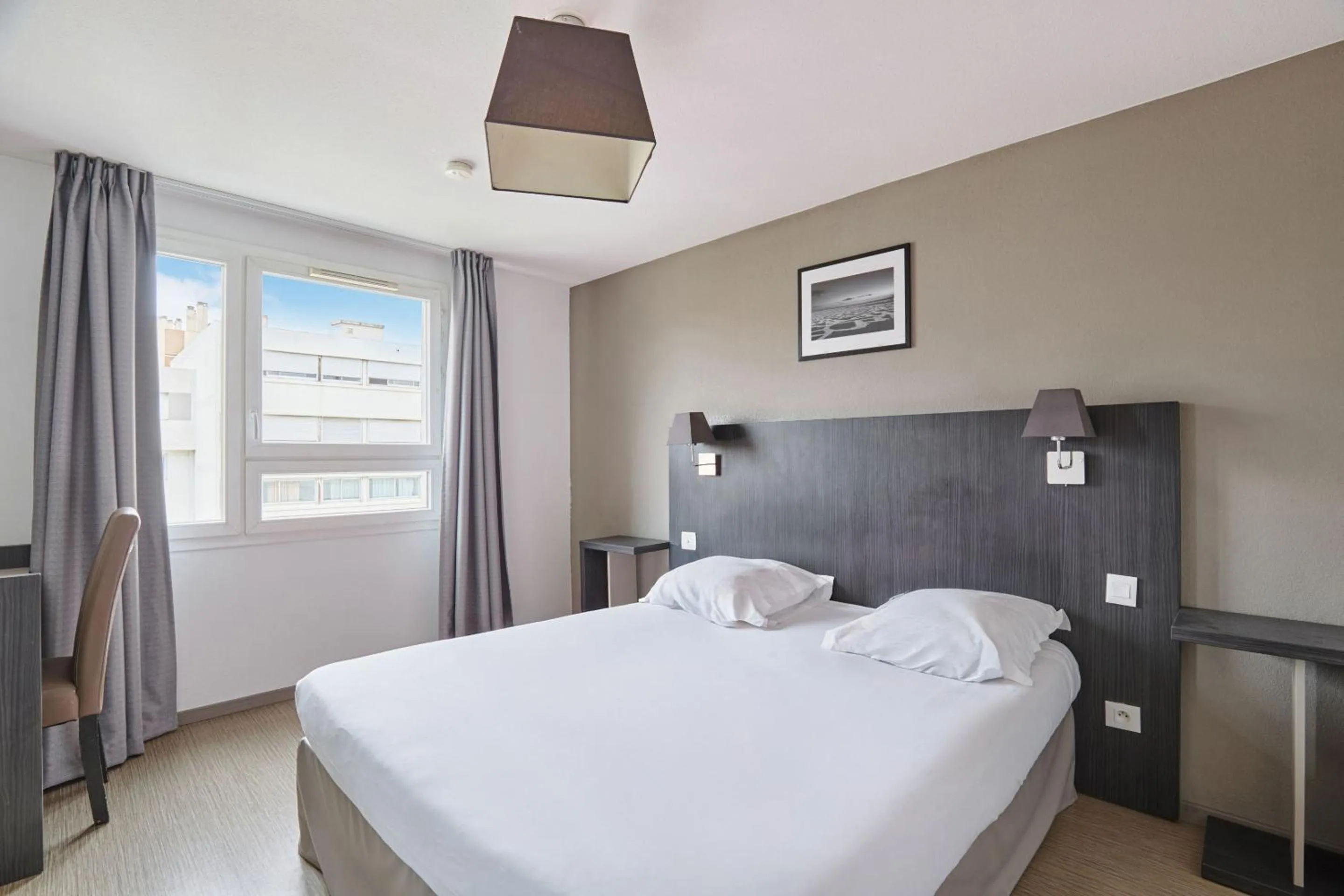 Bed in Appart Hotel Odalys City Marseille Le Dôme