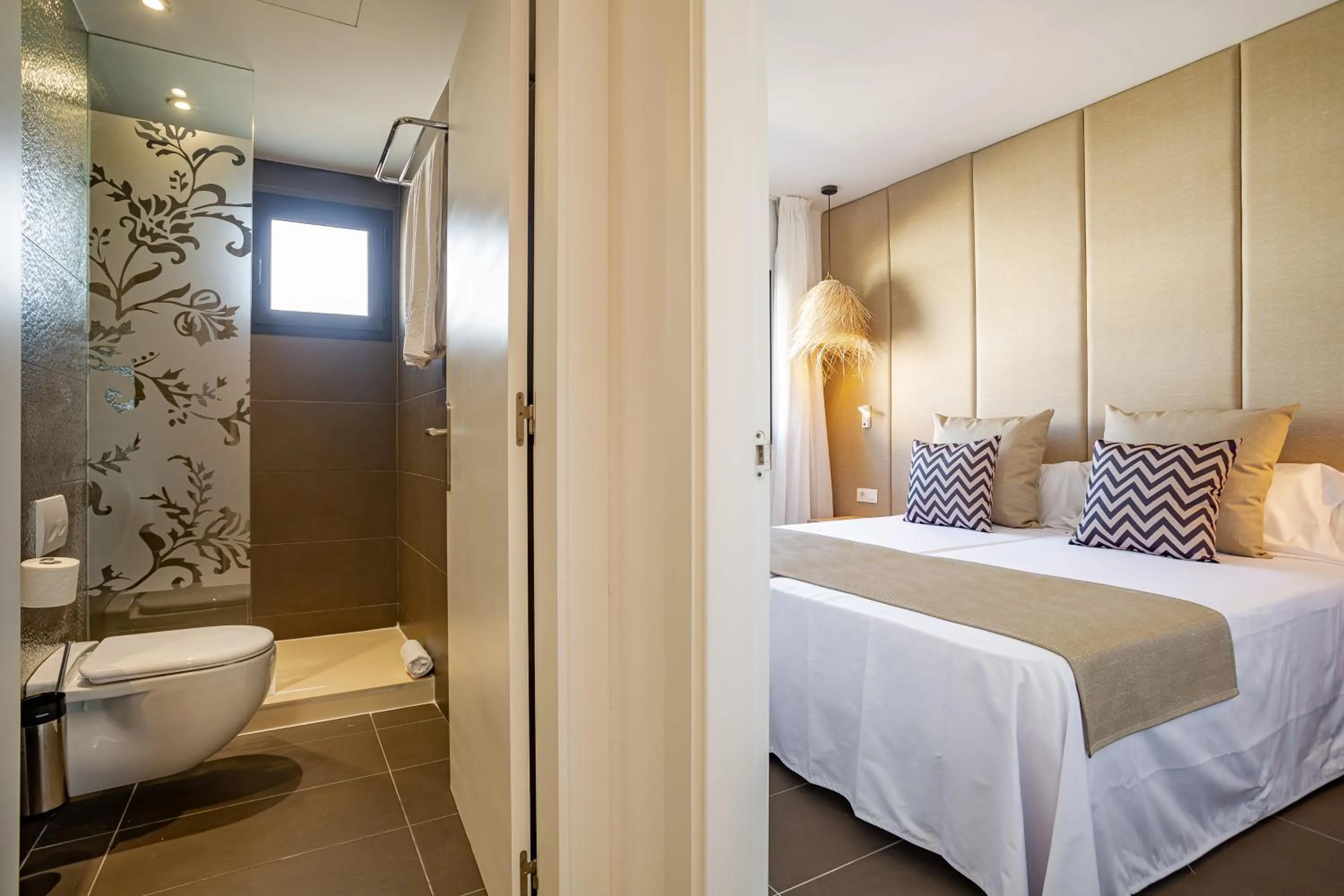 Bathroom, Bed in Migjorn Ibiza Suites & Spa