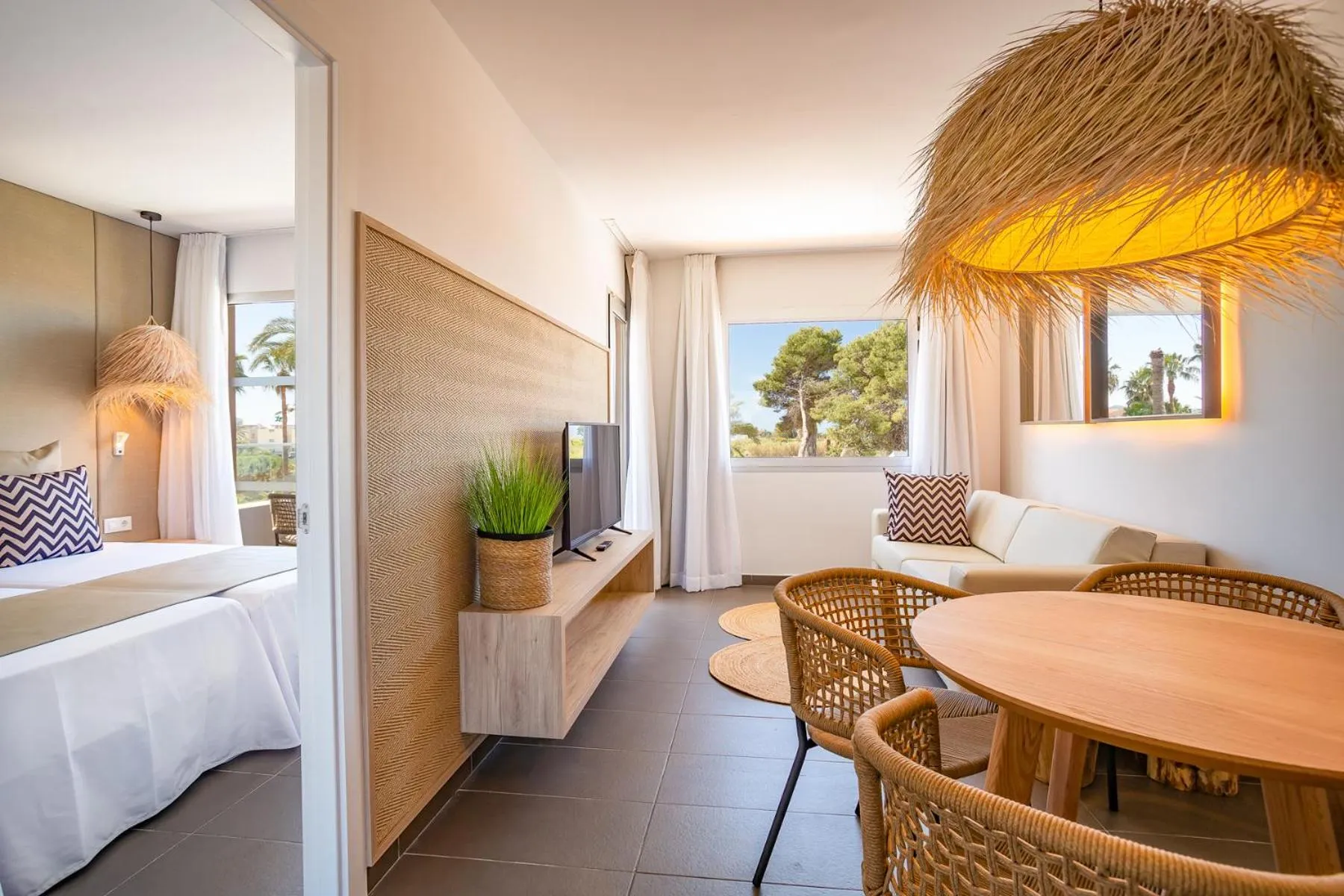 Living room, Bed in Migjorn Ibiza Suites & Spa