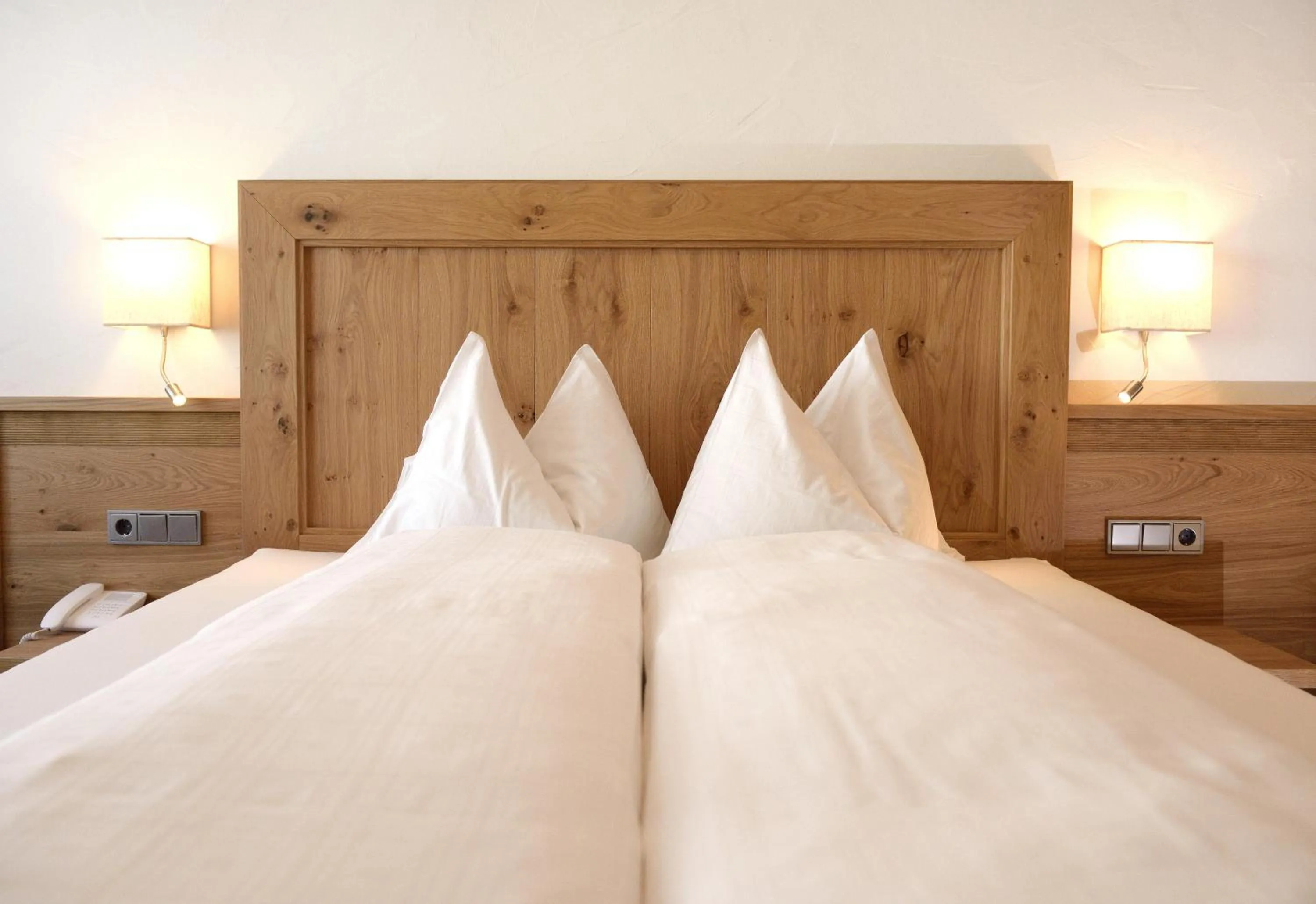 Bed in Aparthotel Garni Monte