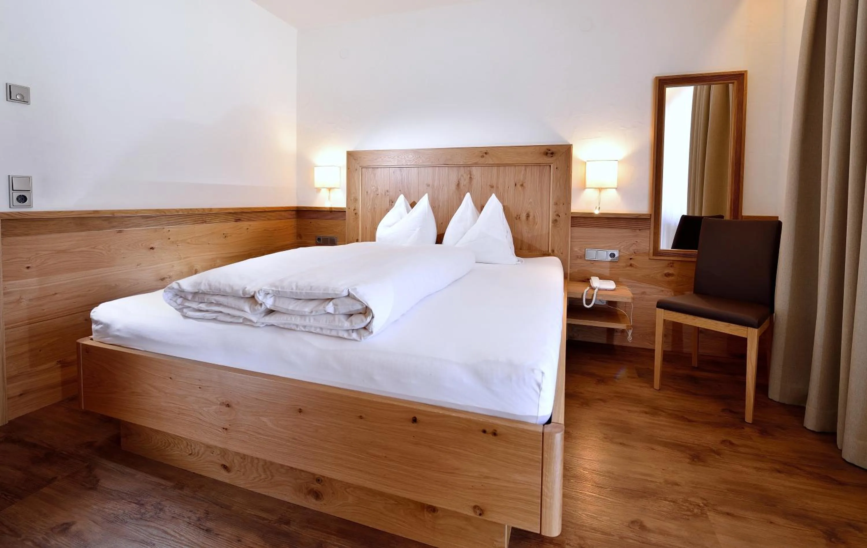 Bed in Aparthotel Garni Monte