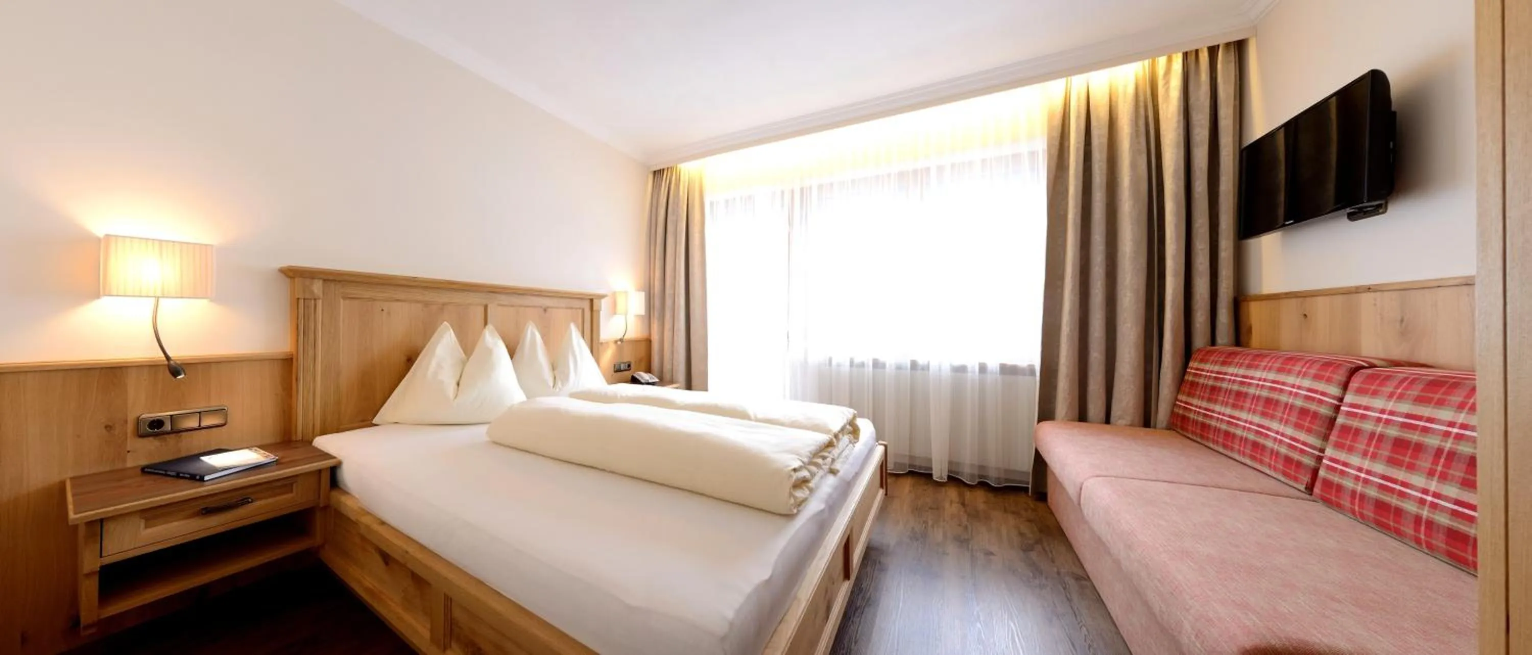 Bed in Aparthotel Garni Monte