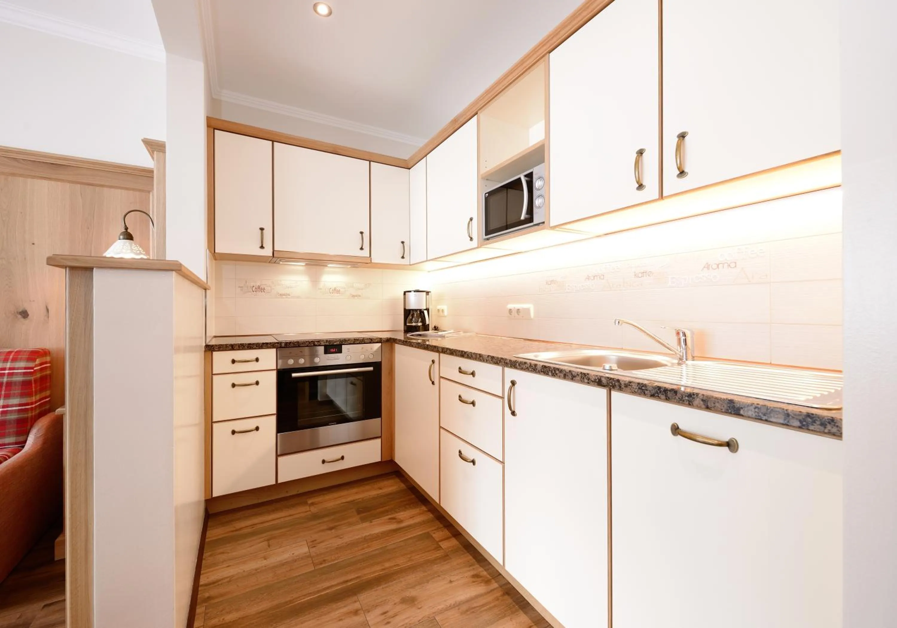 Kitchen or kitchenette in Aparthotel Garni Monte