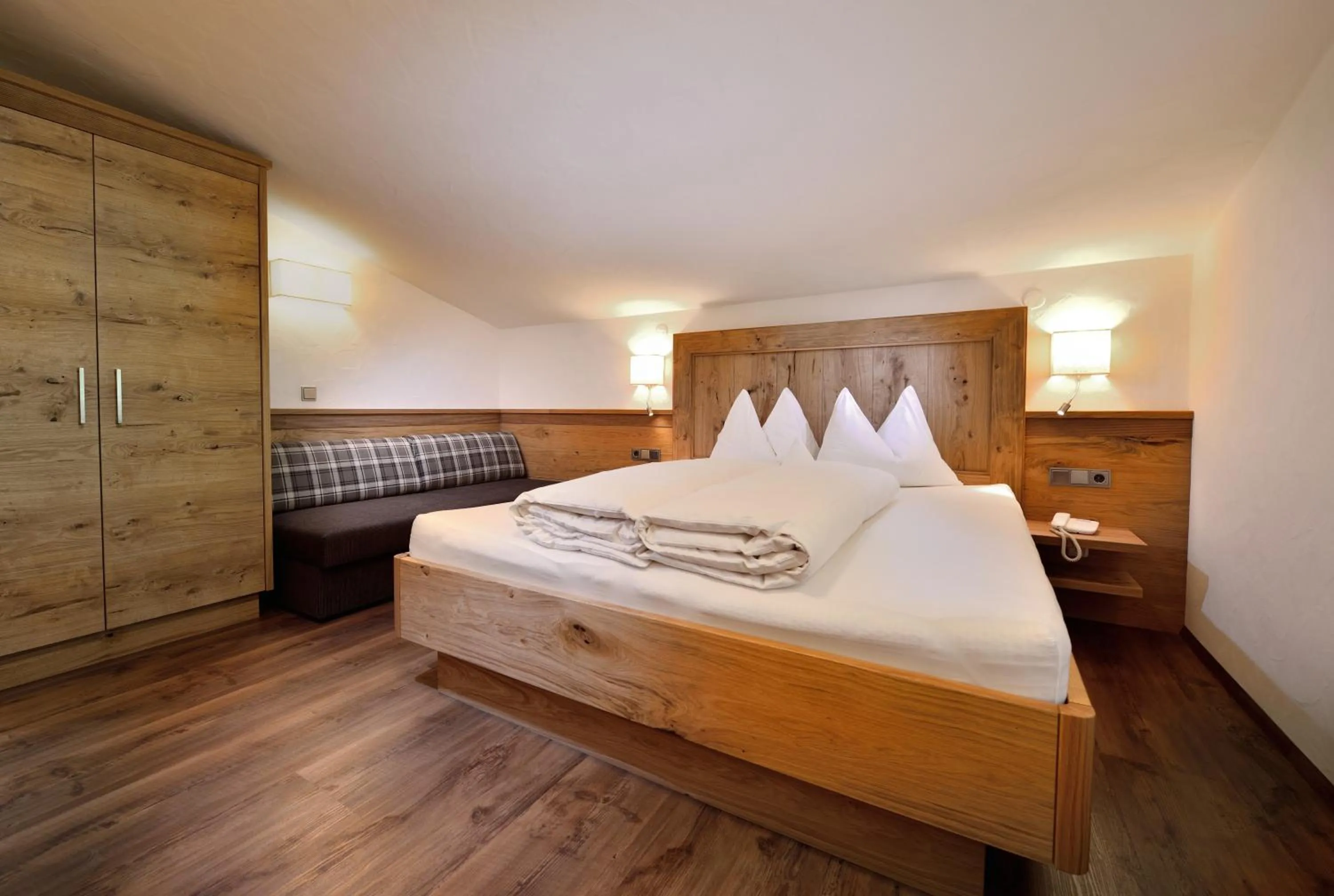 Bed in Aparthotel Garni Monte