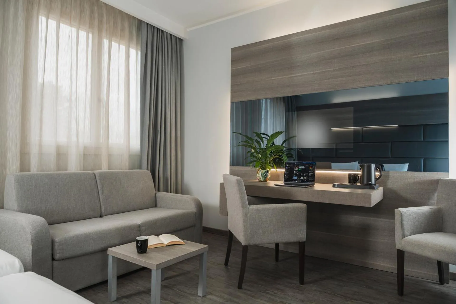 Seating area in Just Hotel Saronno