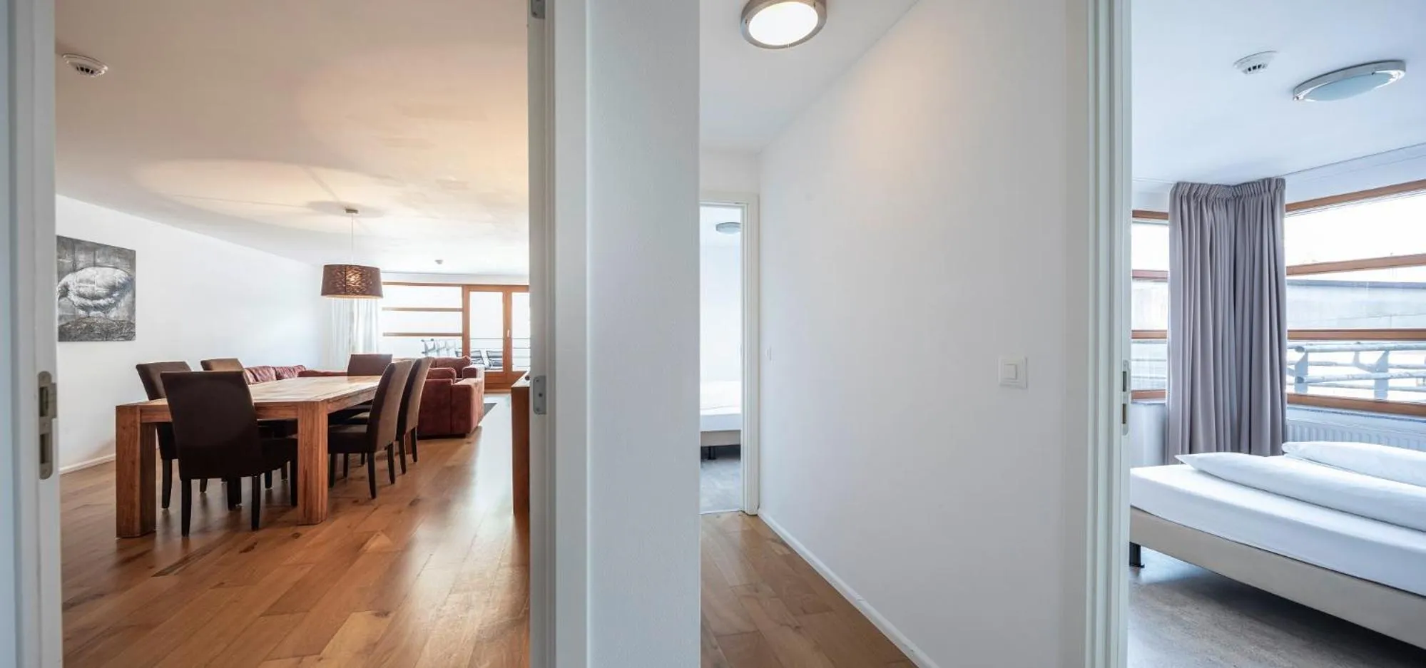 Living room, Bed in Marina Walensee Hotel