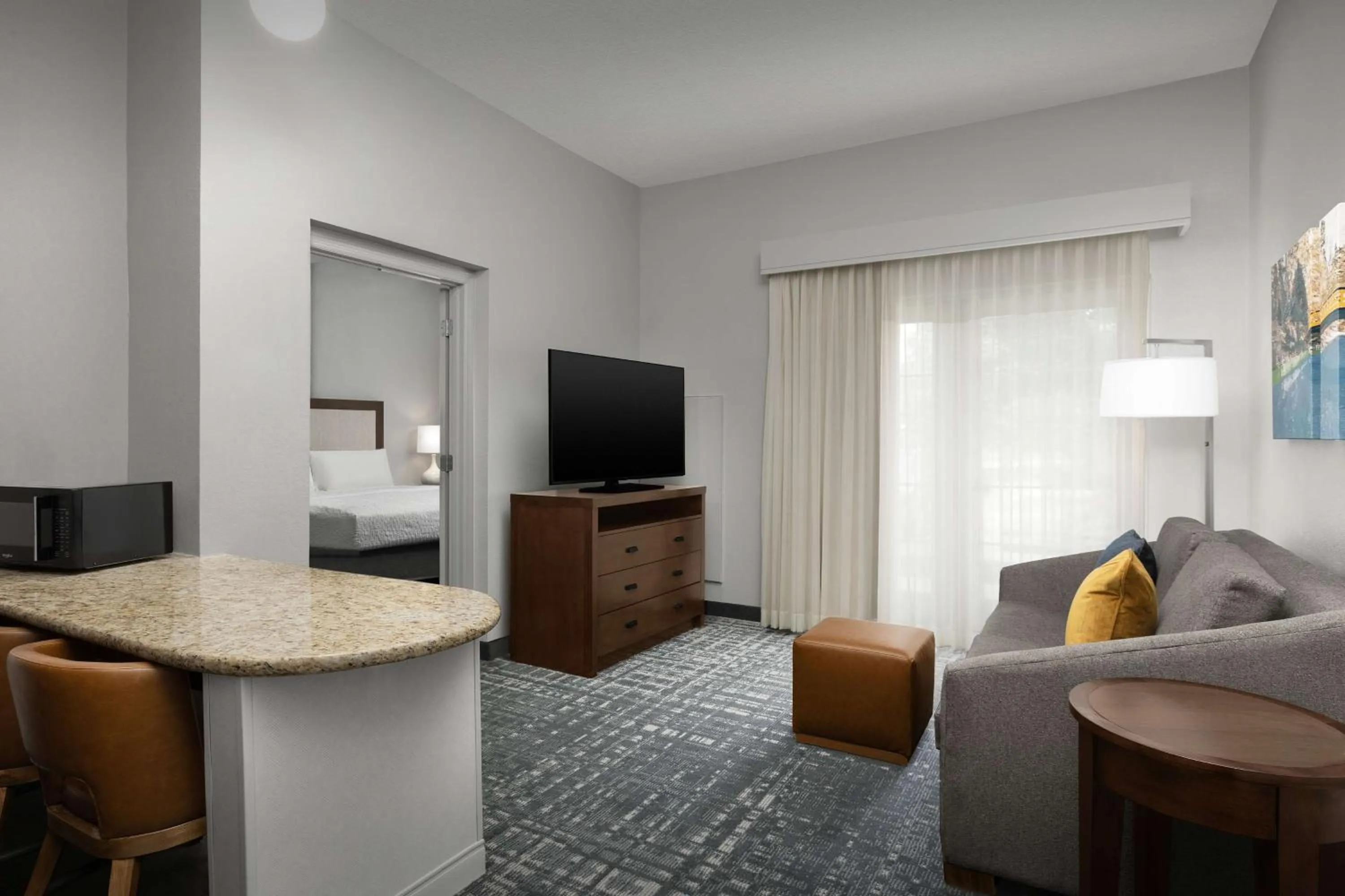 Living room in Homewood Suites by Hilton Raleigh-Durham Airport at RTP