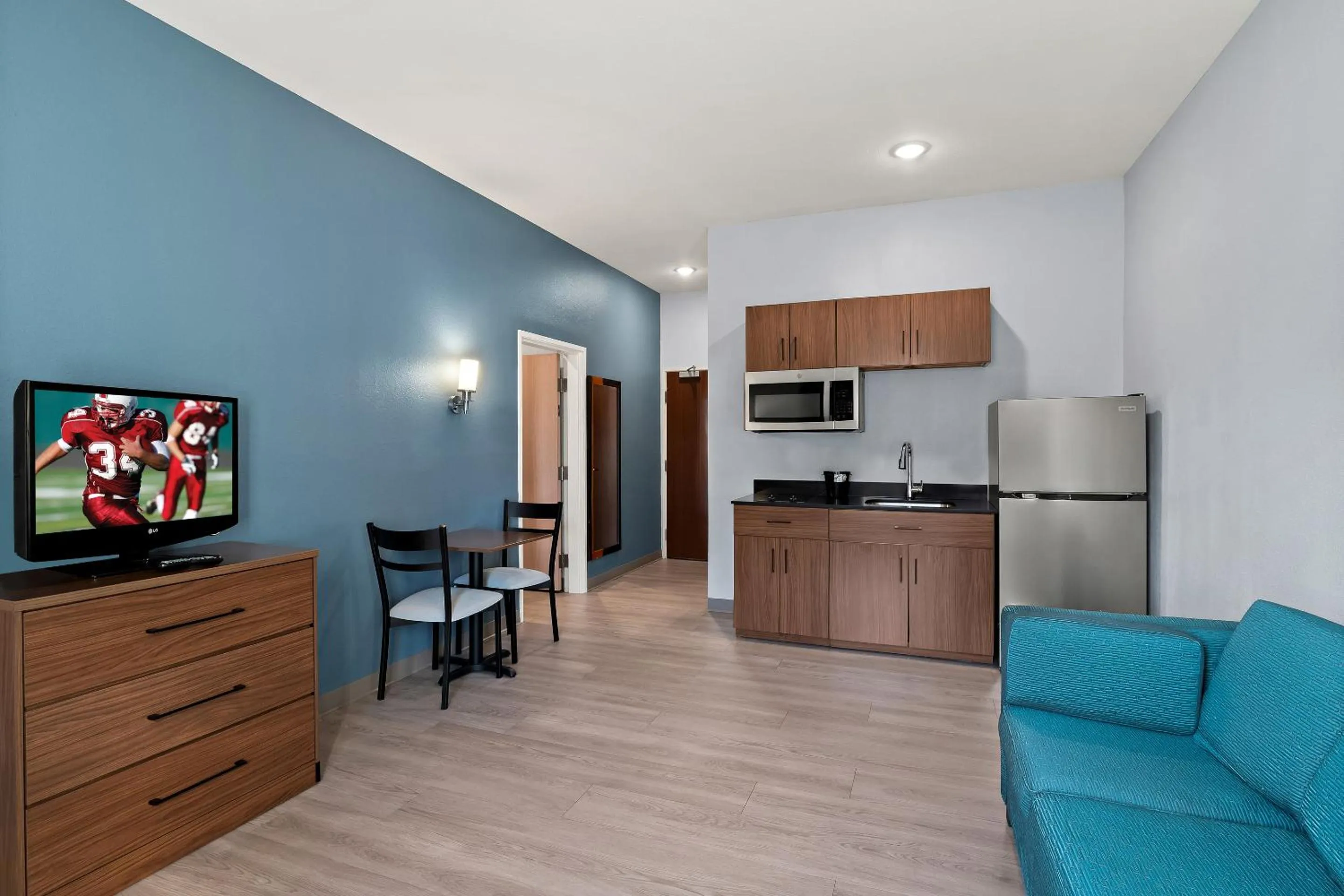 Photo of the whole room in HomeTowne Studios by Red Roof East Lansing - Okemos