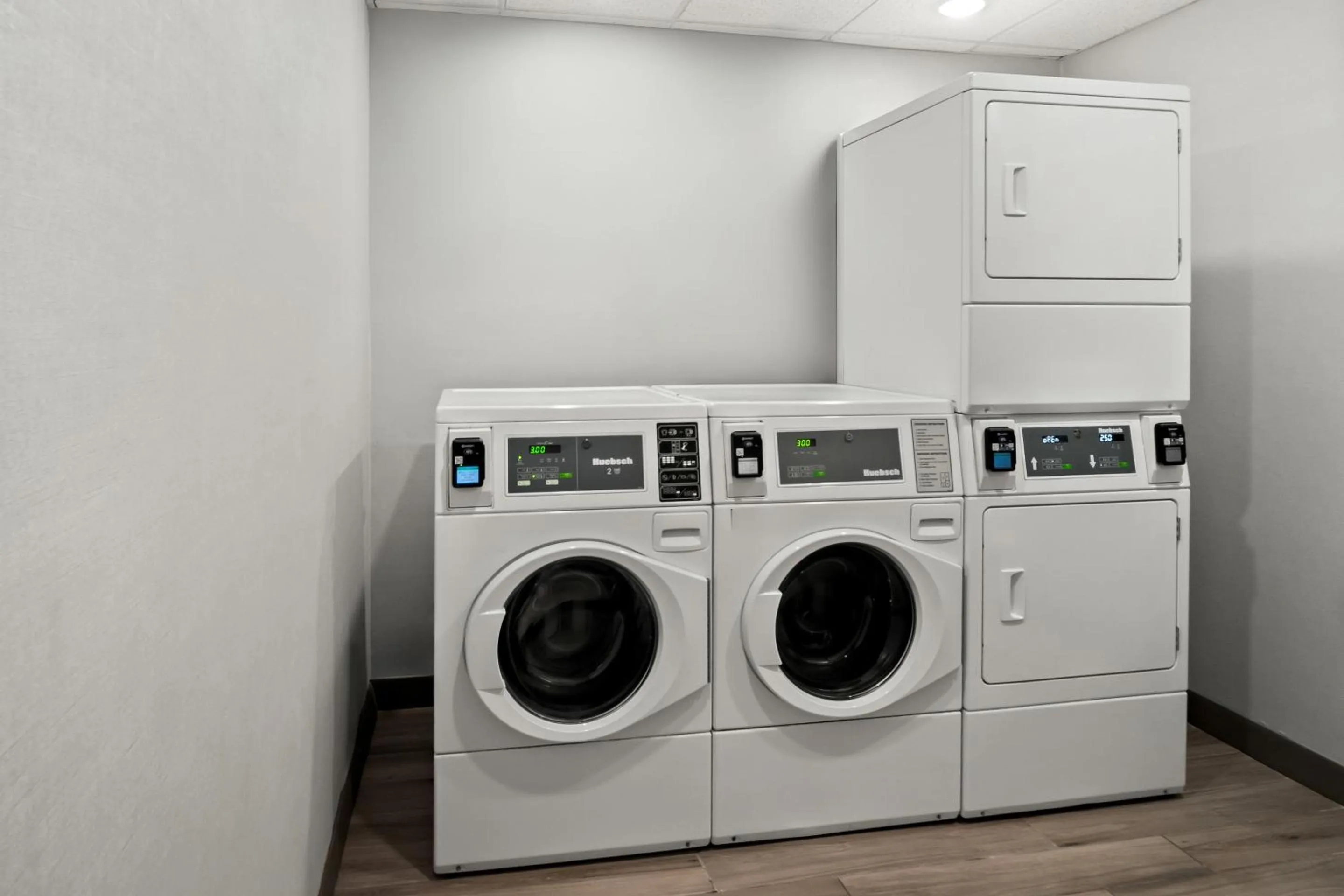 laundry in HomeTowne Studios by Red Roof East Lansing - Okemos