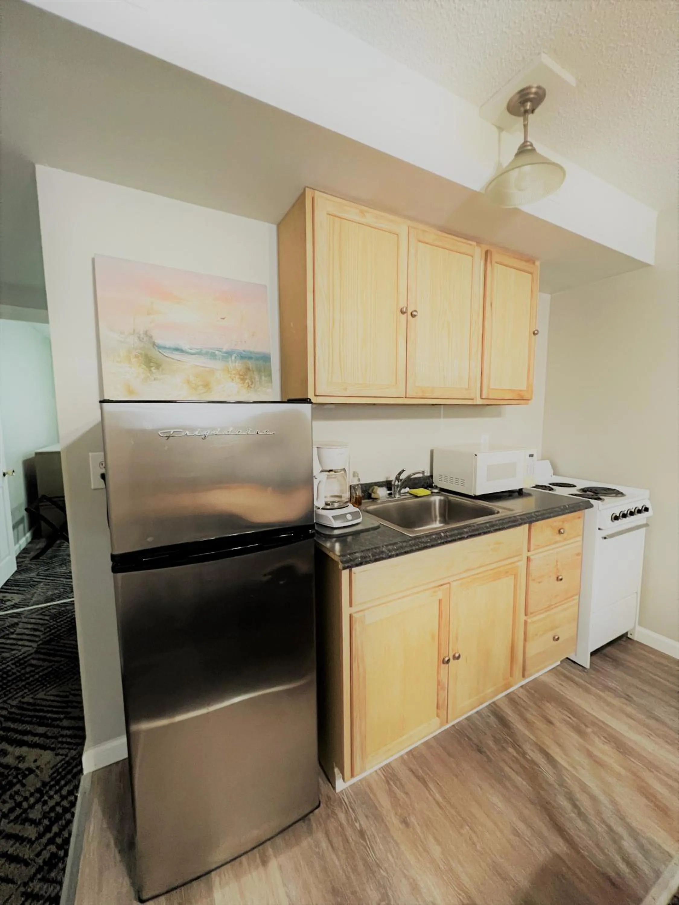 Kitchen or kitchenette in Sand Dollar Motel