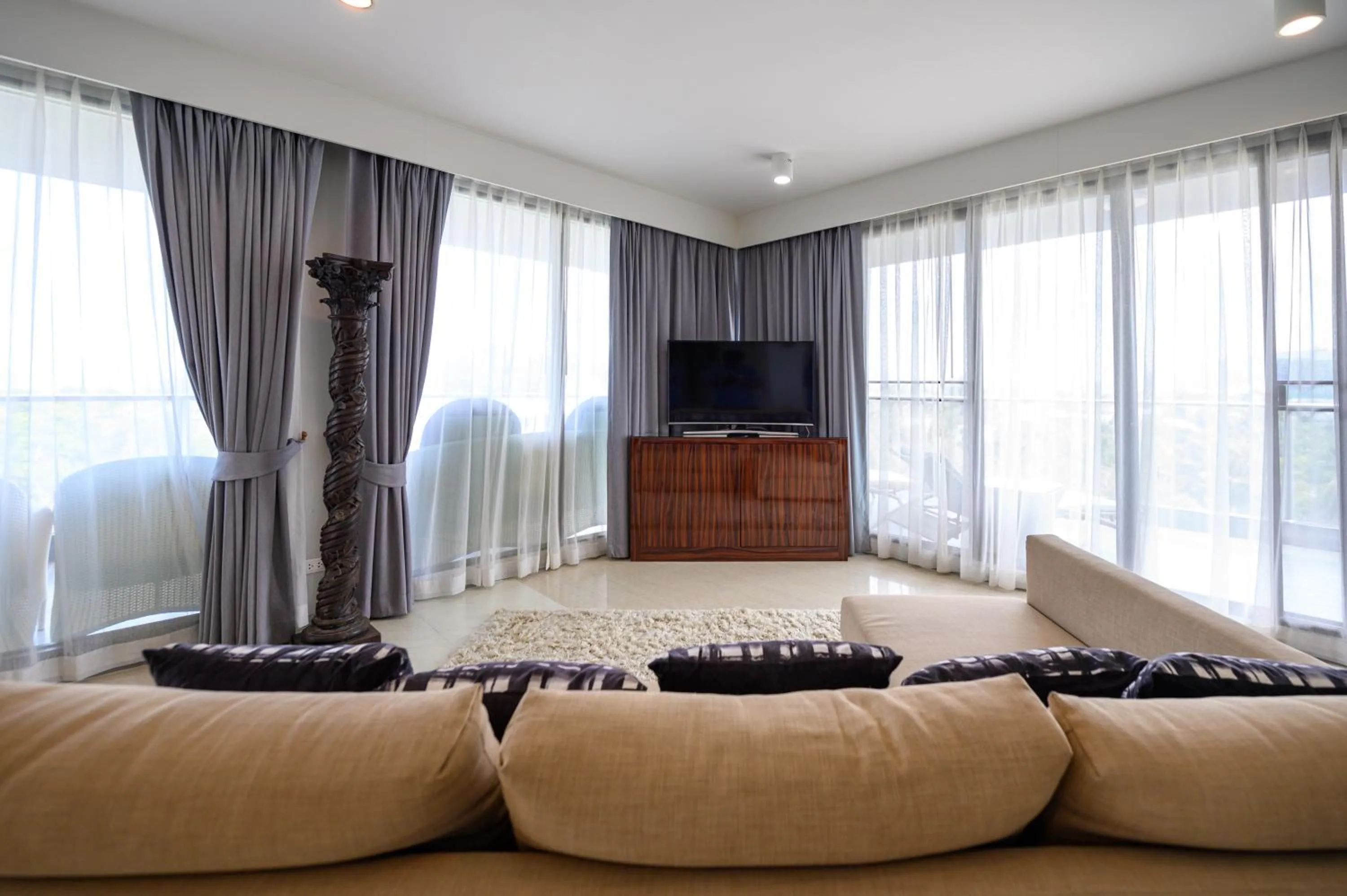 Living room in 6th Avenue Surin Beach - Official Account