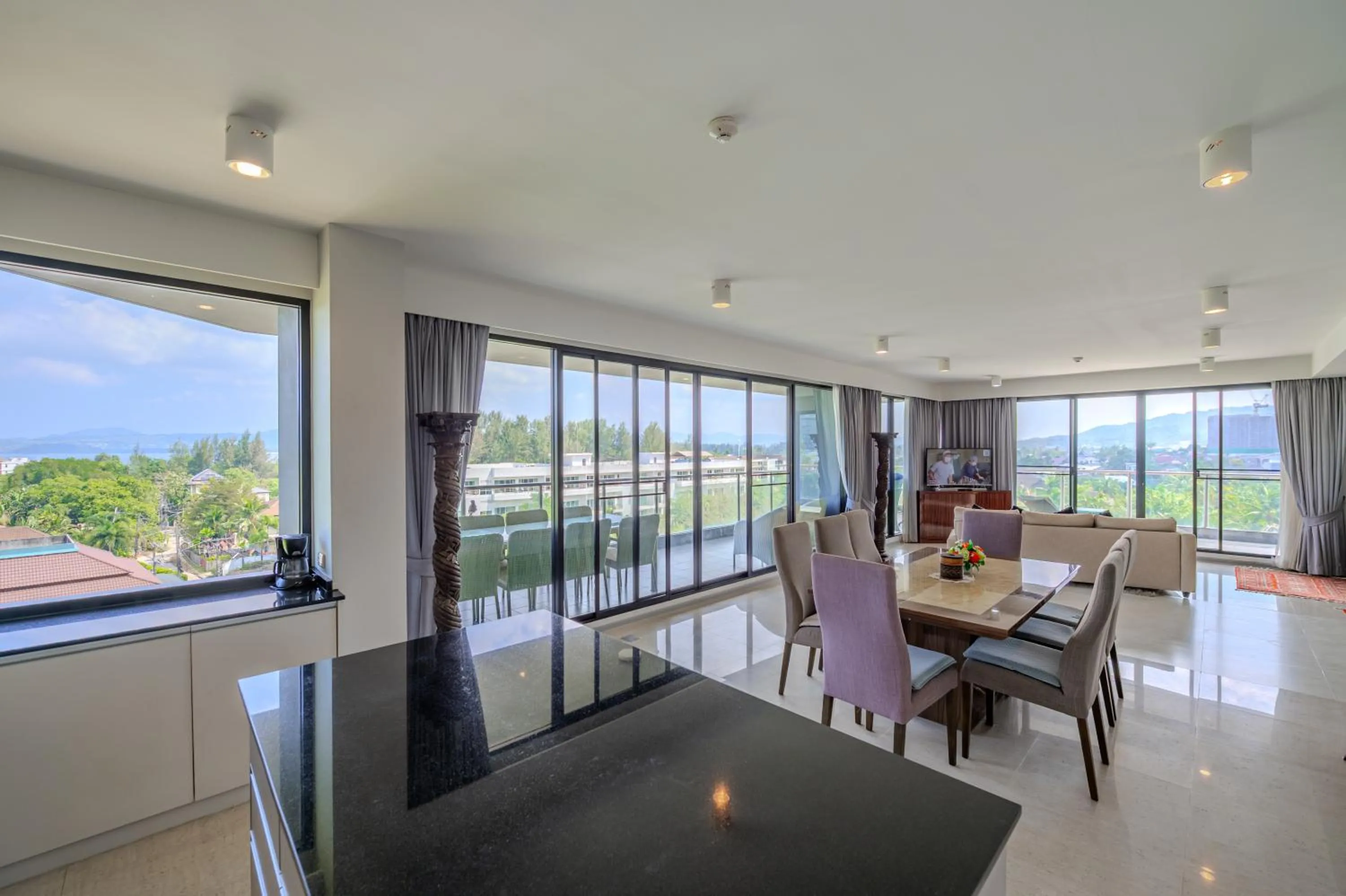 Living room in 6th Avenue Surin Beach - Official Account