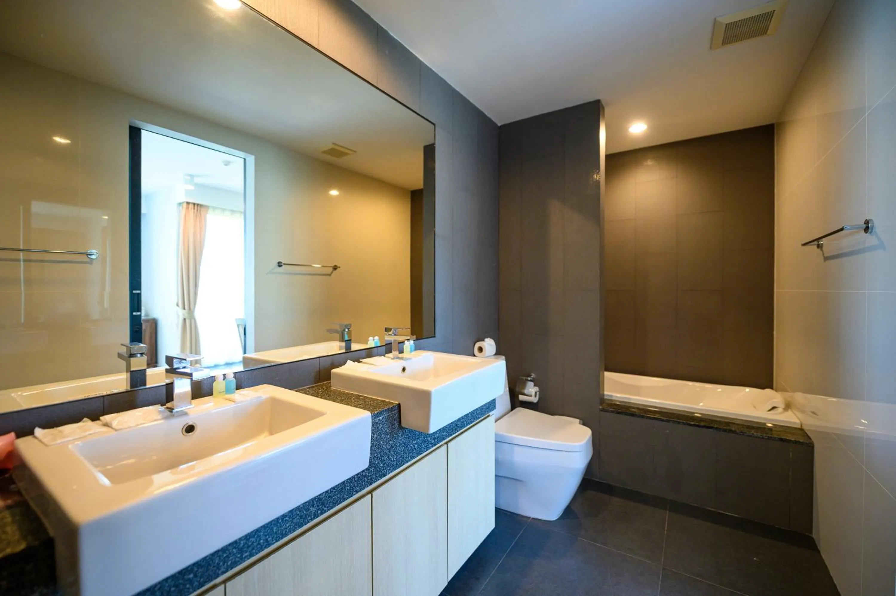 Bathroom in 6th Avenue Surin Beach - Official Account