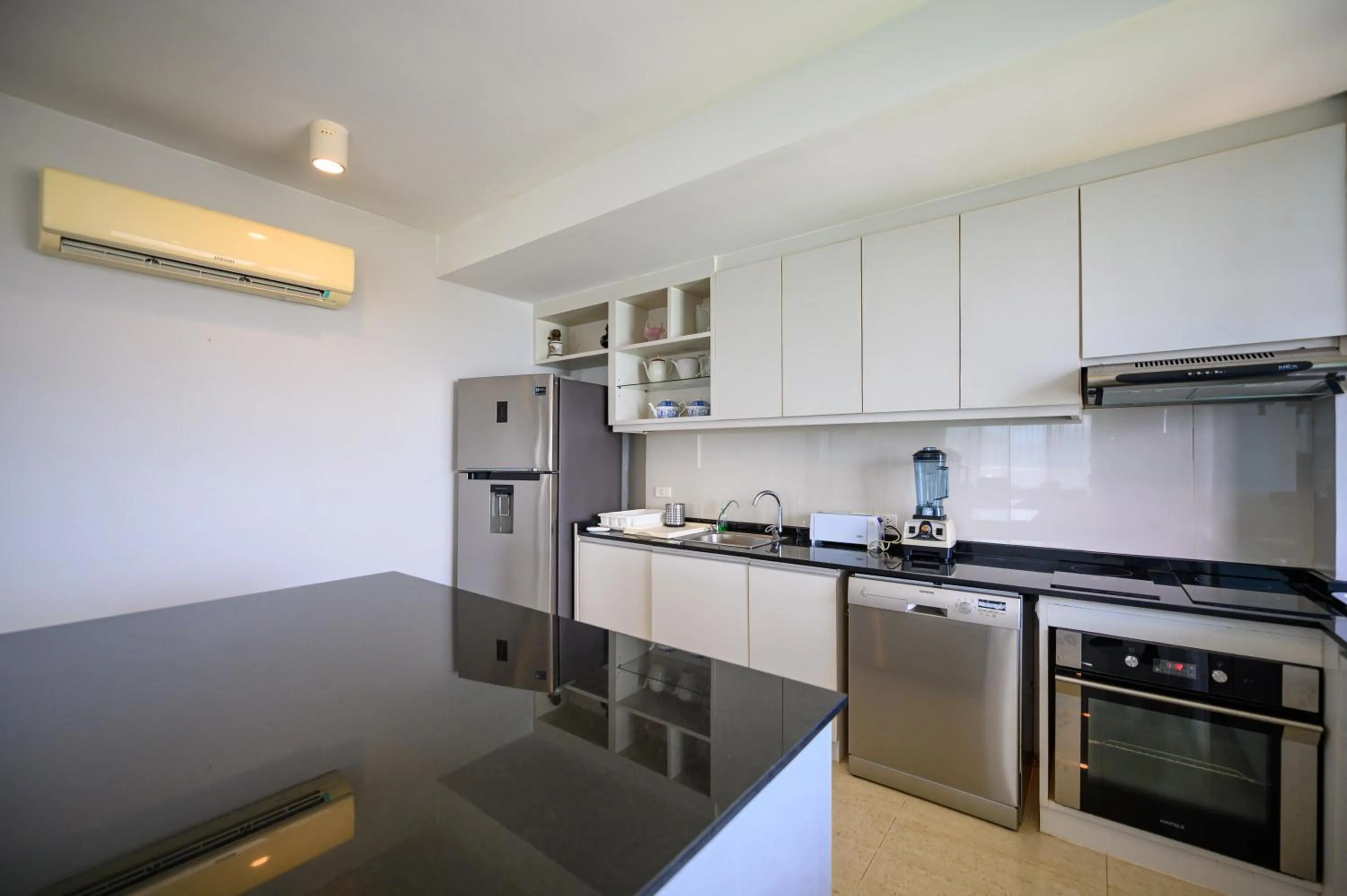 kitchen in 6th Avenue Surin Beach - Official Account