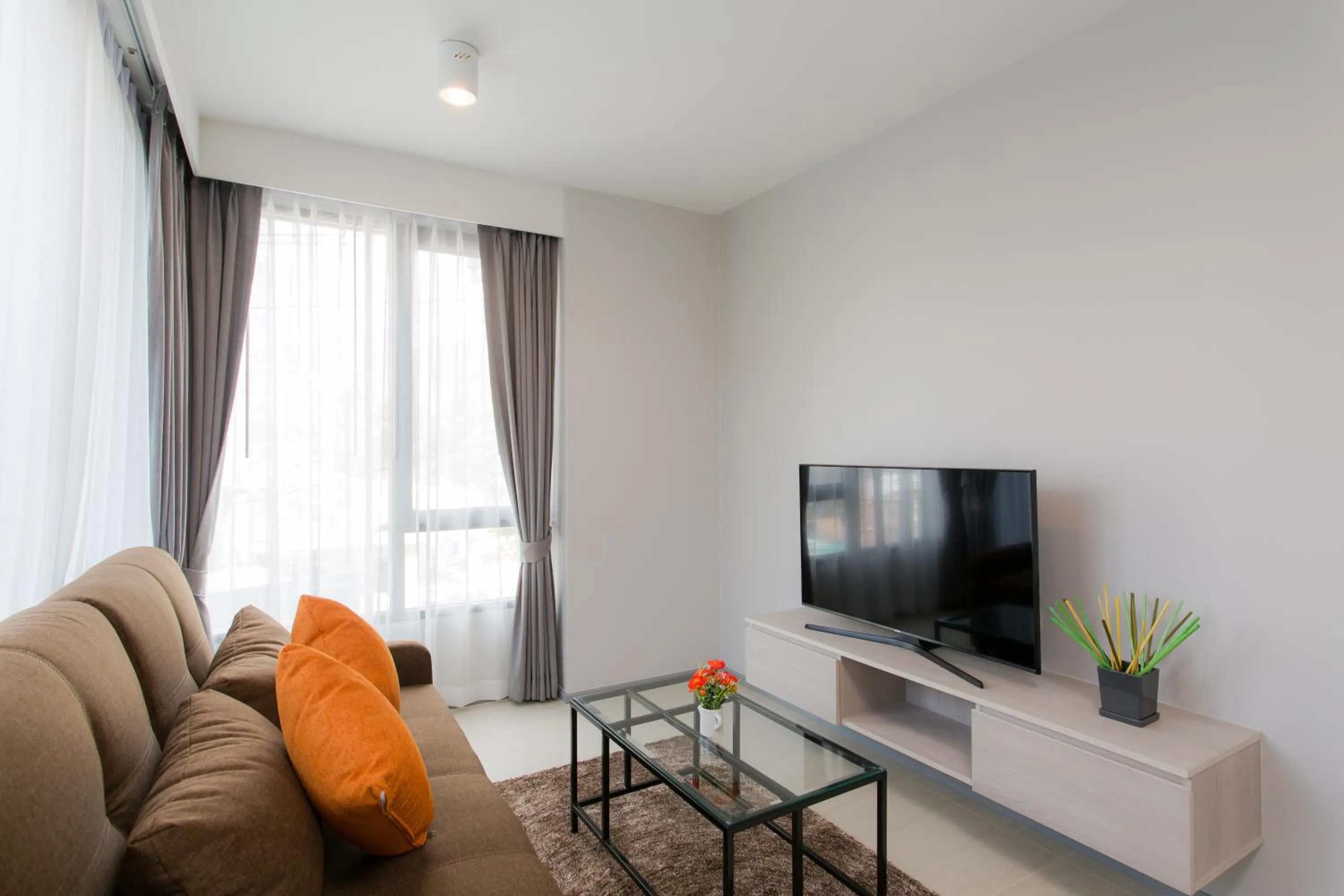 Living room in 6th Avenue Surin Beach - Official Account