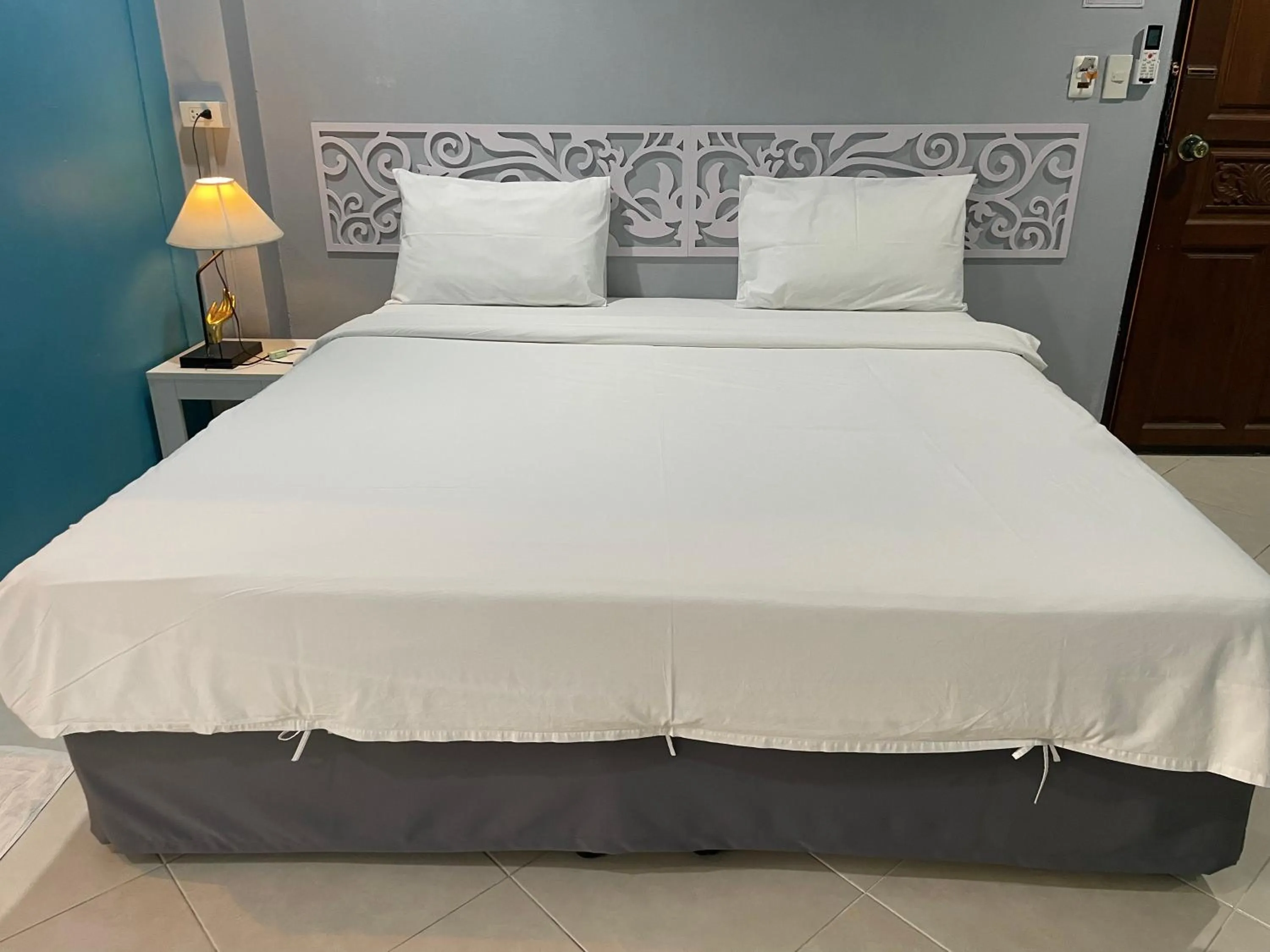 Bed in Nawaporn Place