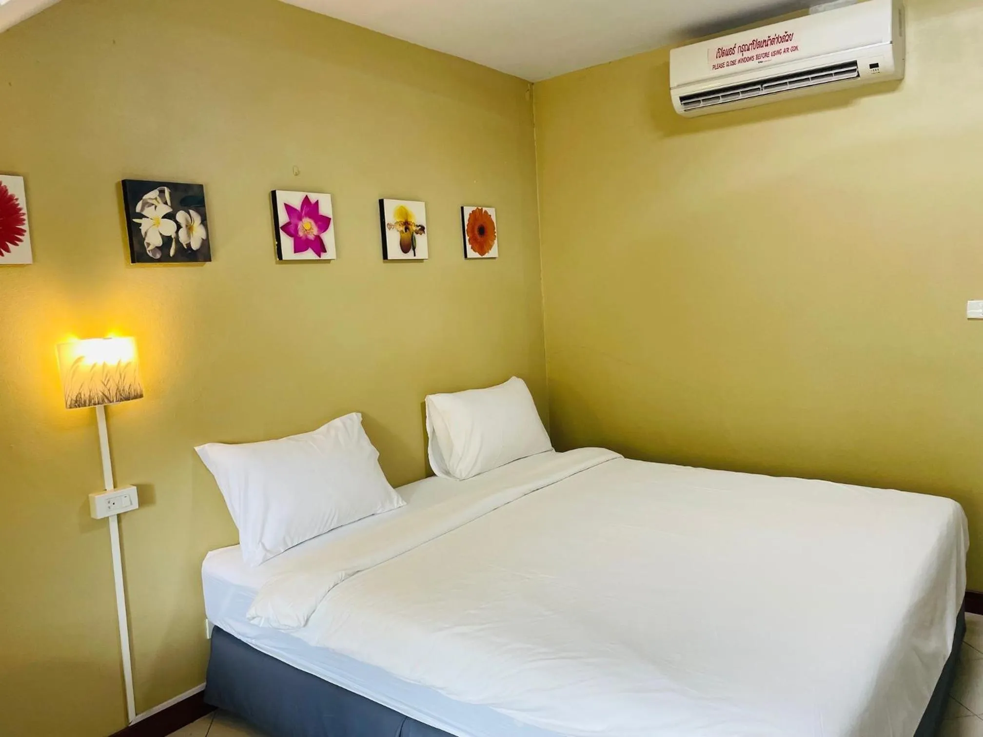 Bed in Nawaporn Place