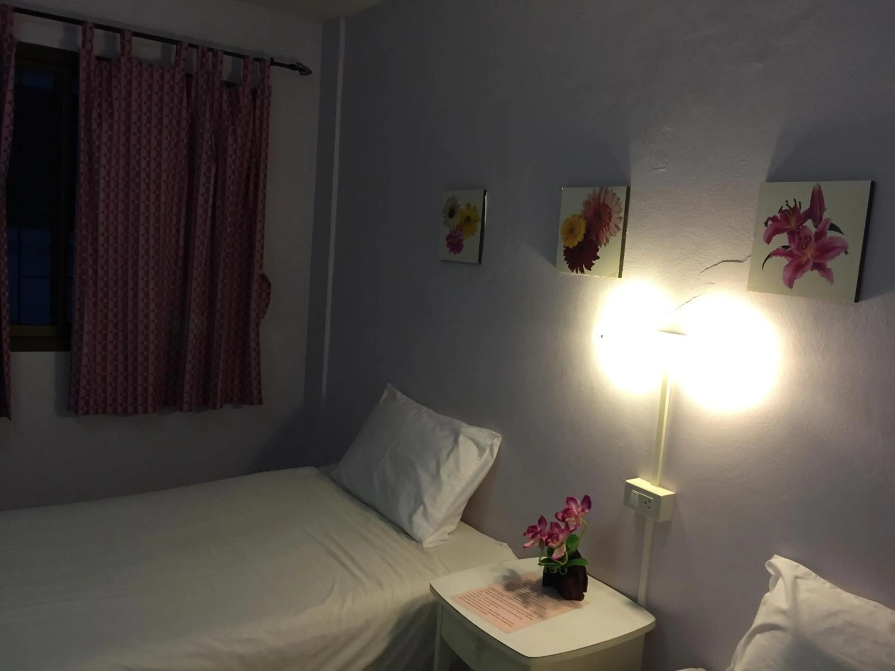 Bed in Nawaporn Place