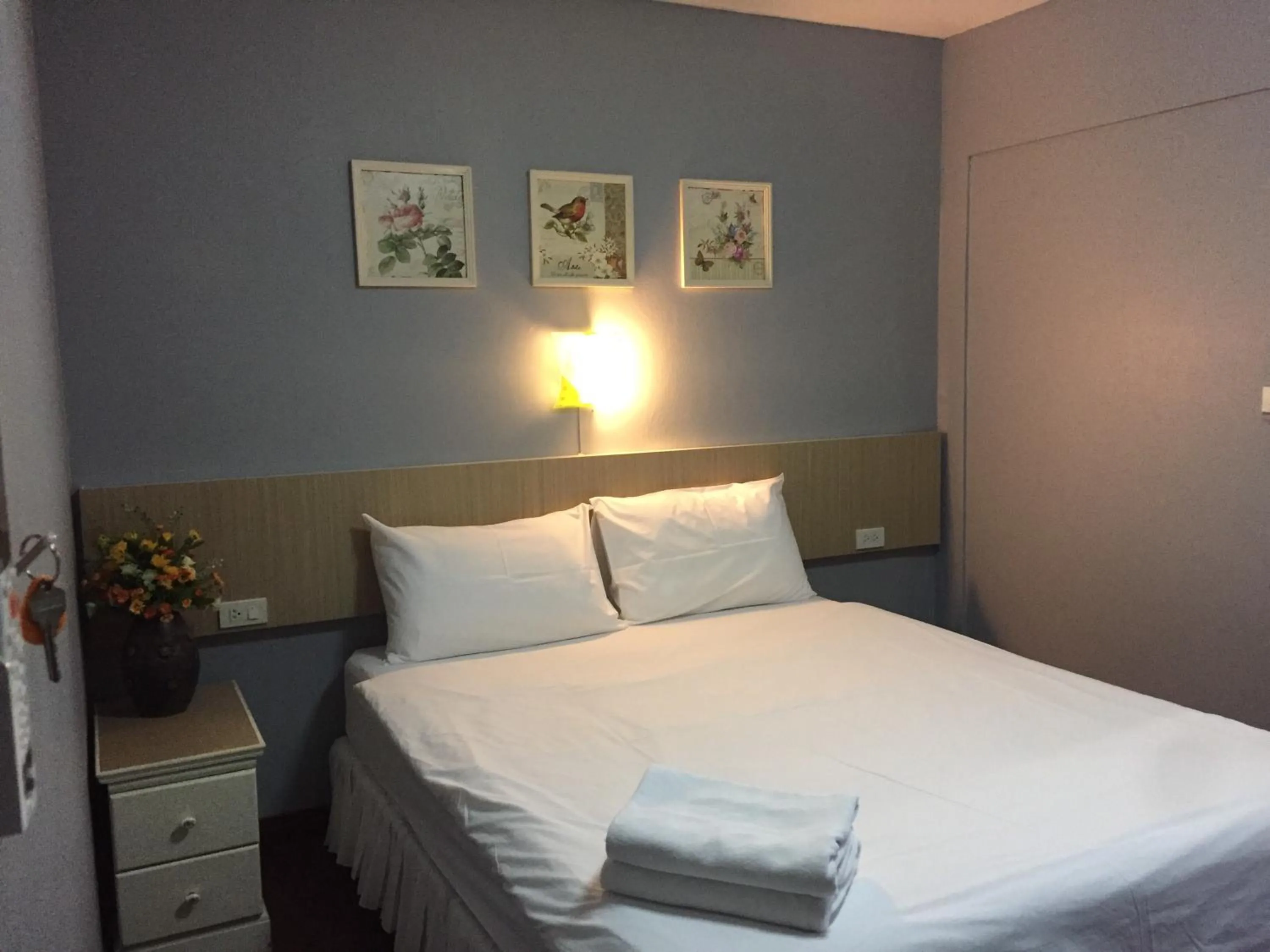 Bed in Nawaporn Place