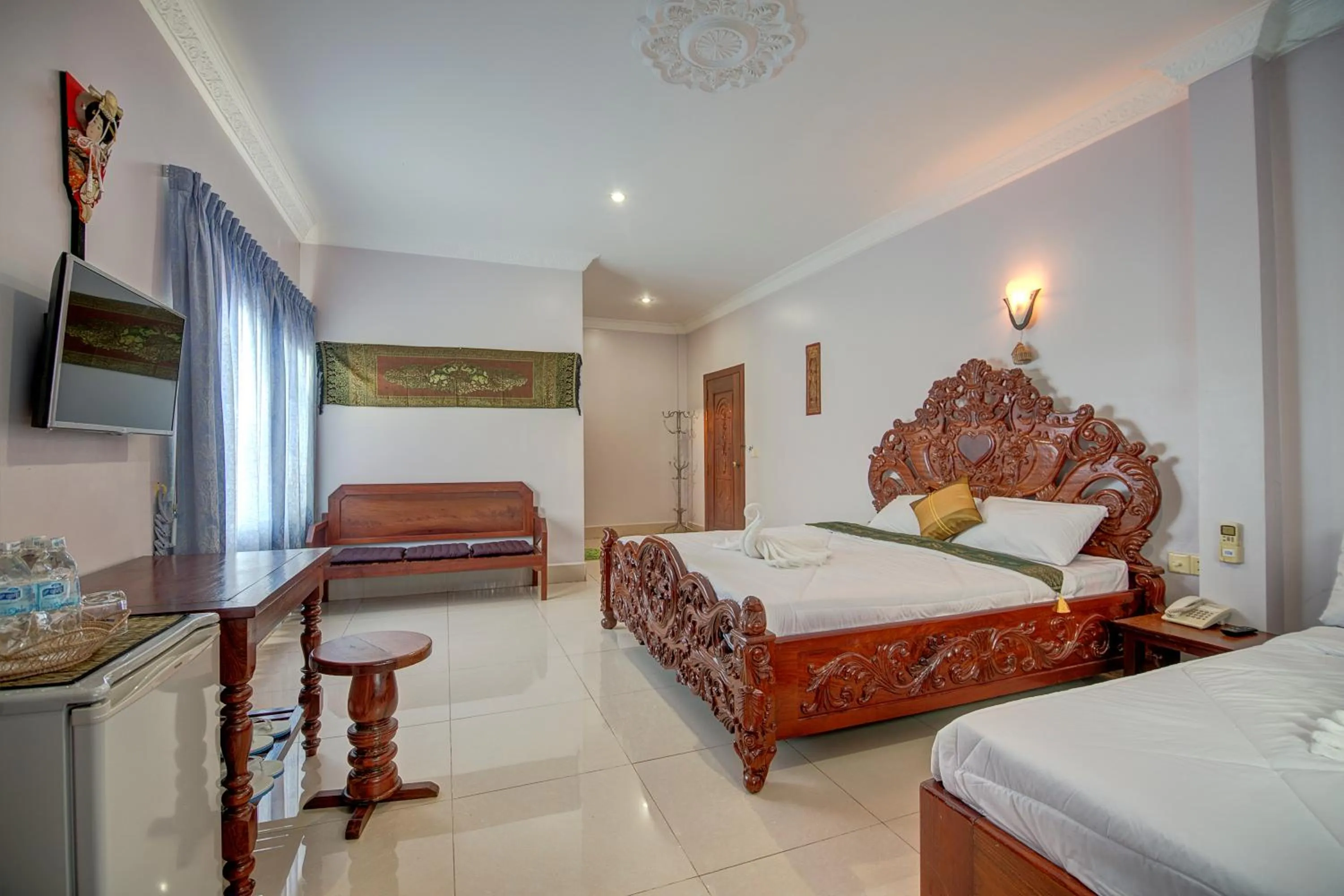 Photo of the whole room, Bed in DV Angkor Villa