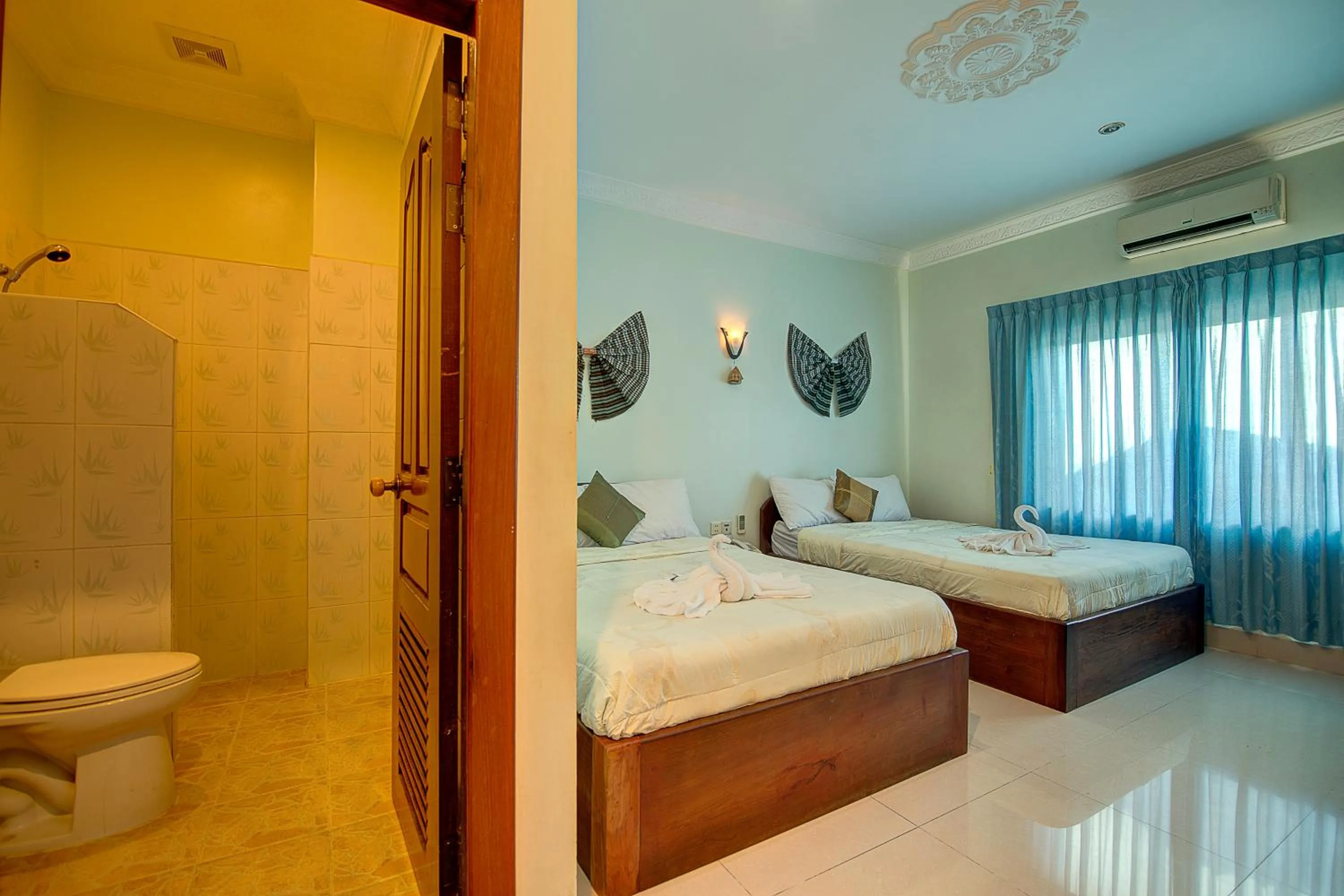 Photo of the whole room, Bed in DV Angkor Villa