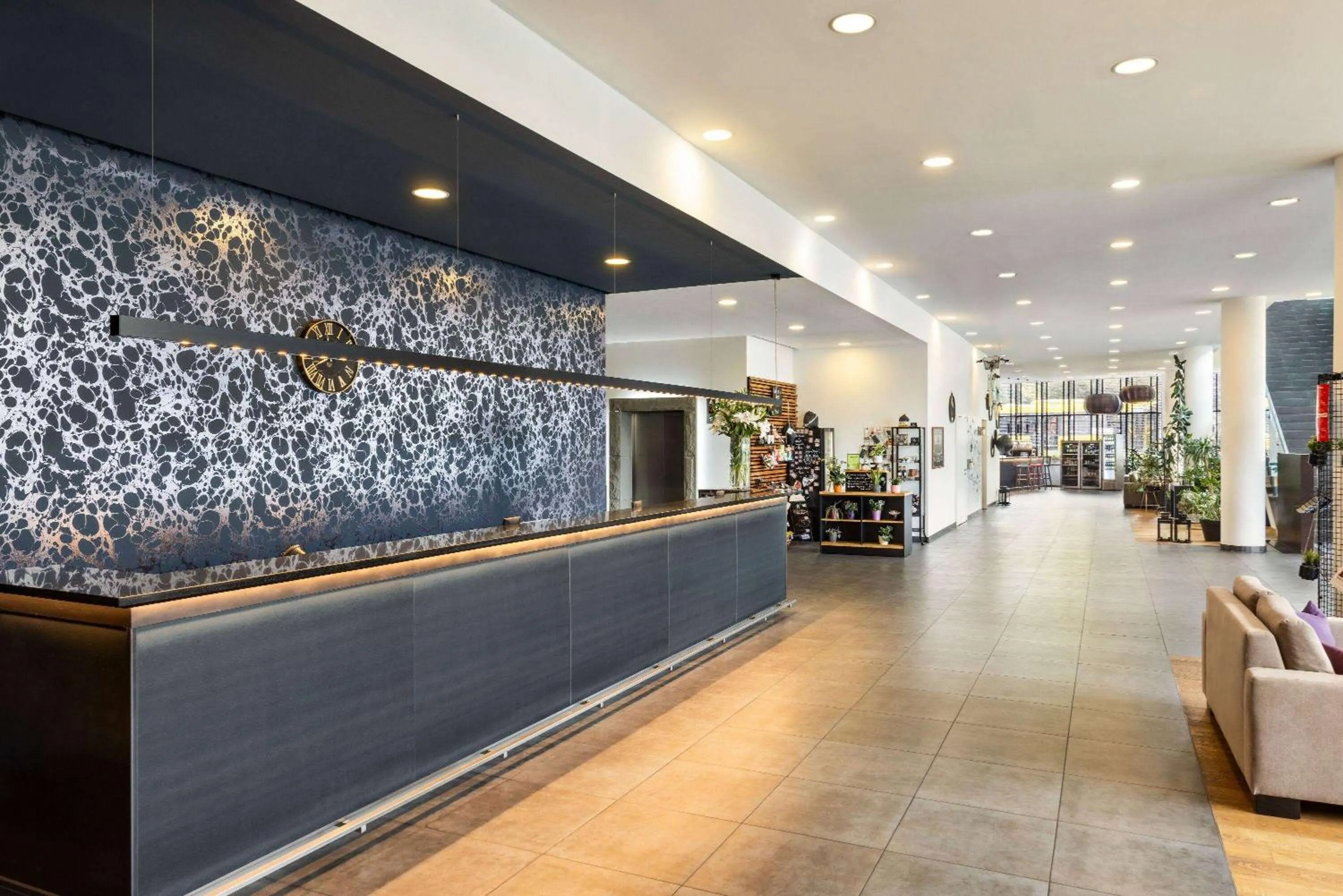 Lobby or reception in Vienna House Easy by Wyndham Katowice