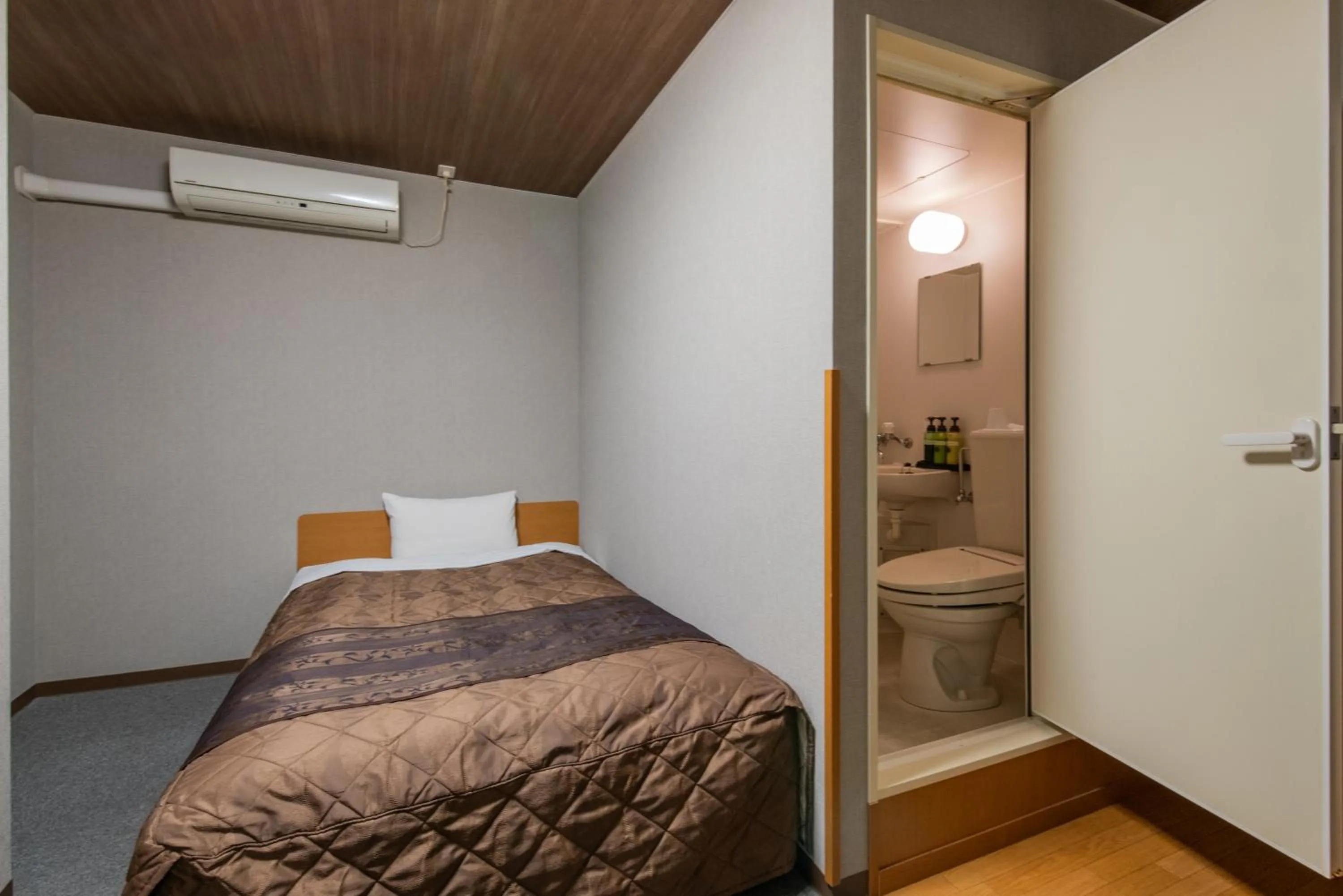 Bed in Hotel Wakamatsu Excel