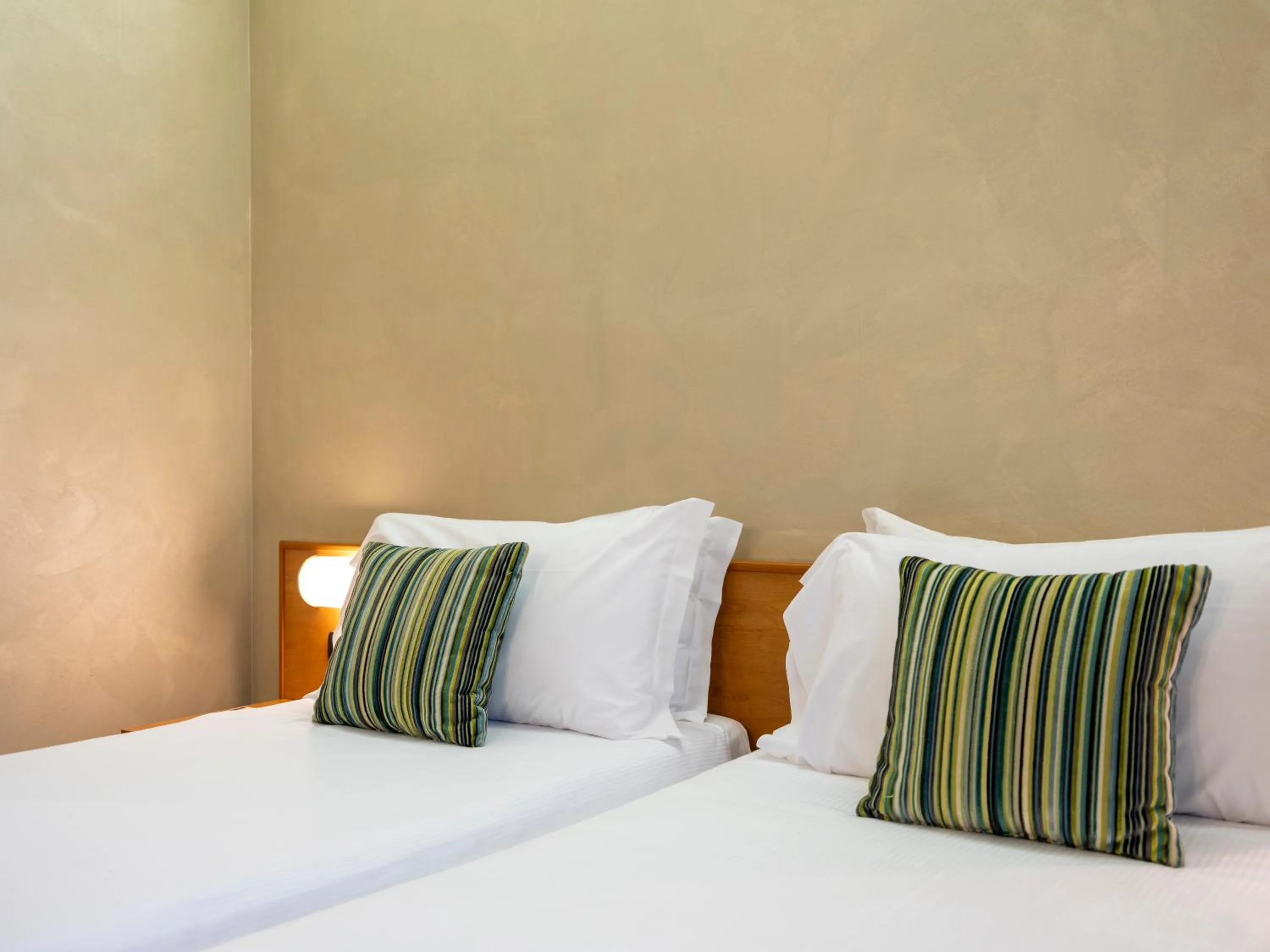 Bed in Hotel Embassy