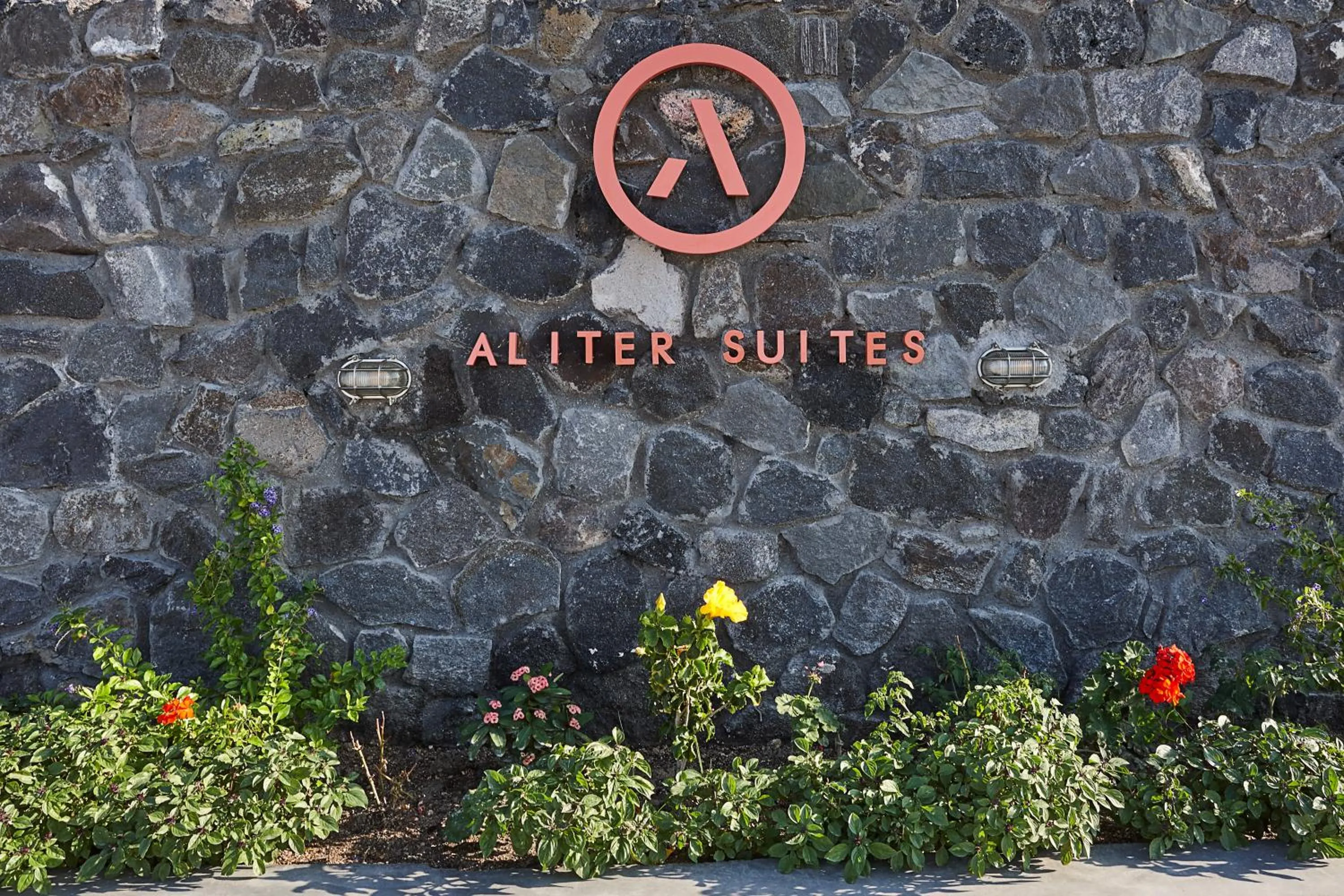 Property logo or sign in Aliter Suites