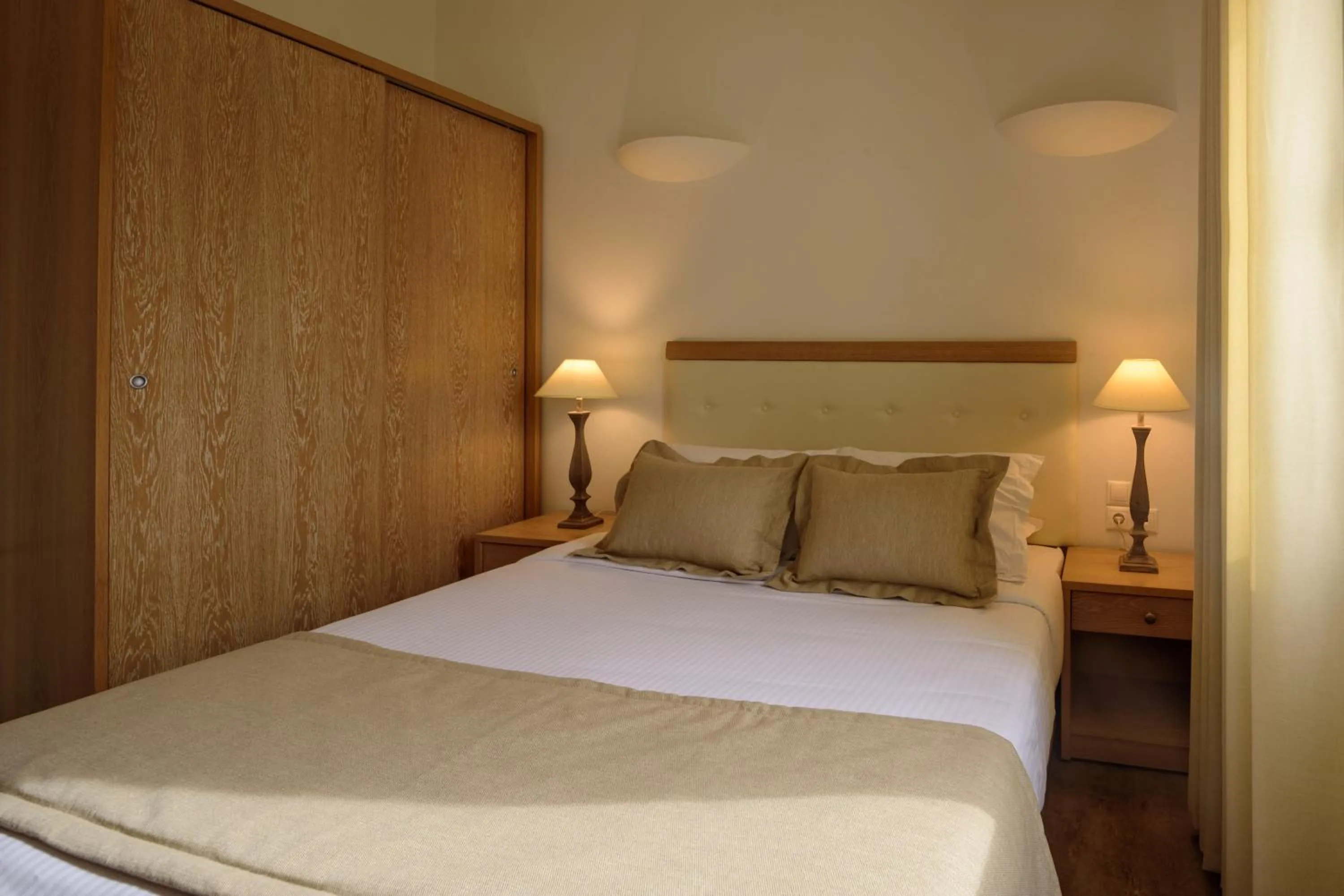 Bed in Aliter Suites