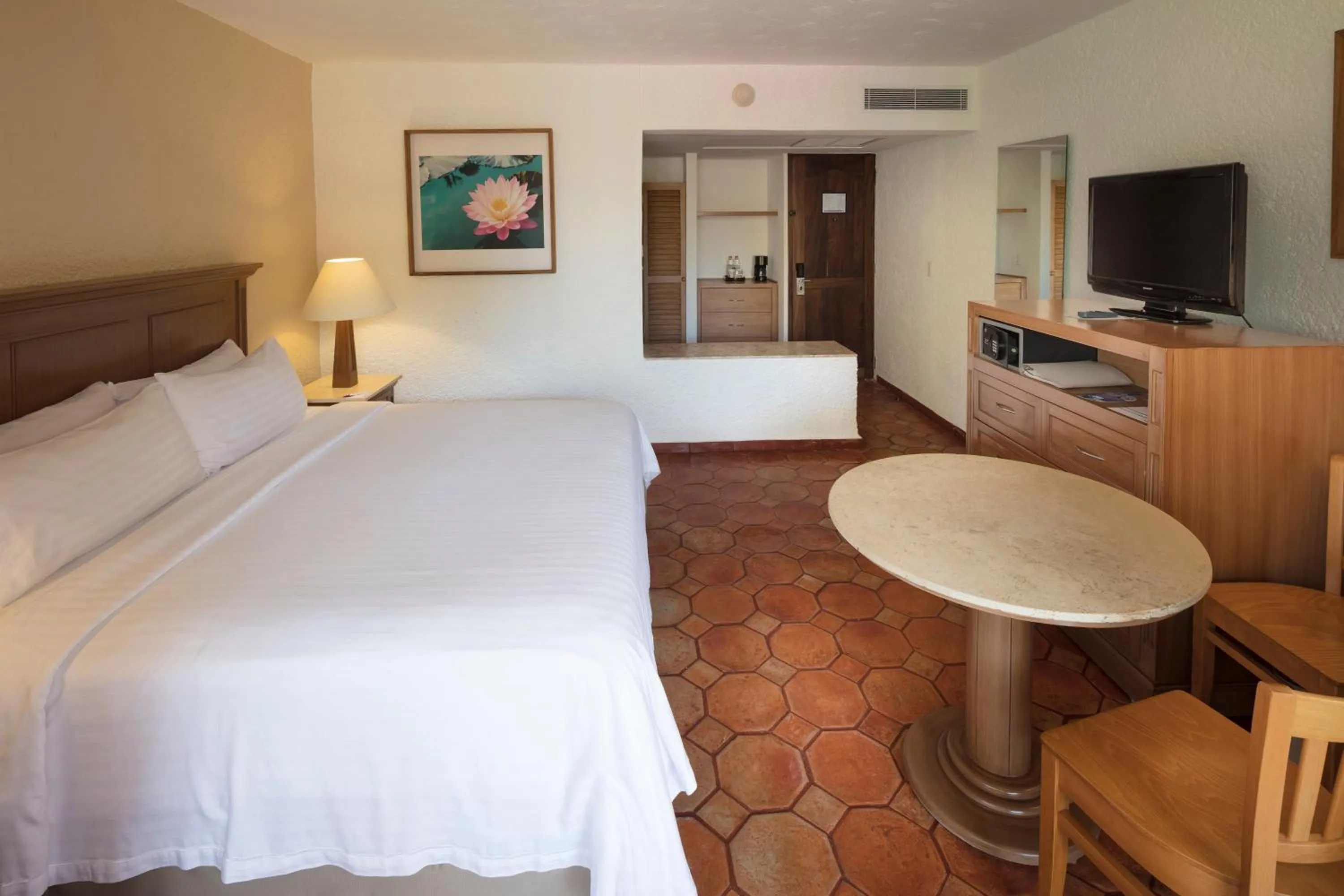 Photo of the whole room, Bed in Holiday Inn Resort Ixtapa All-Inclusive by IHG