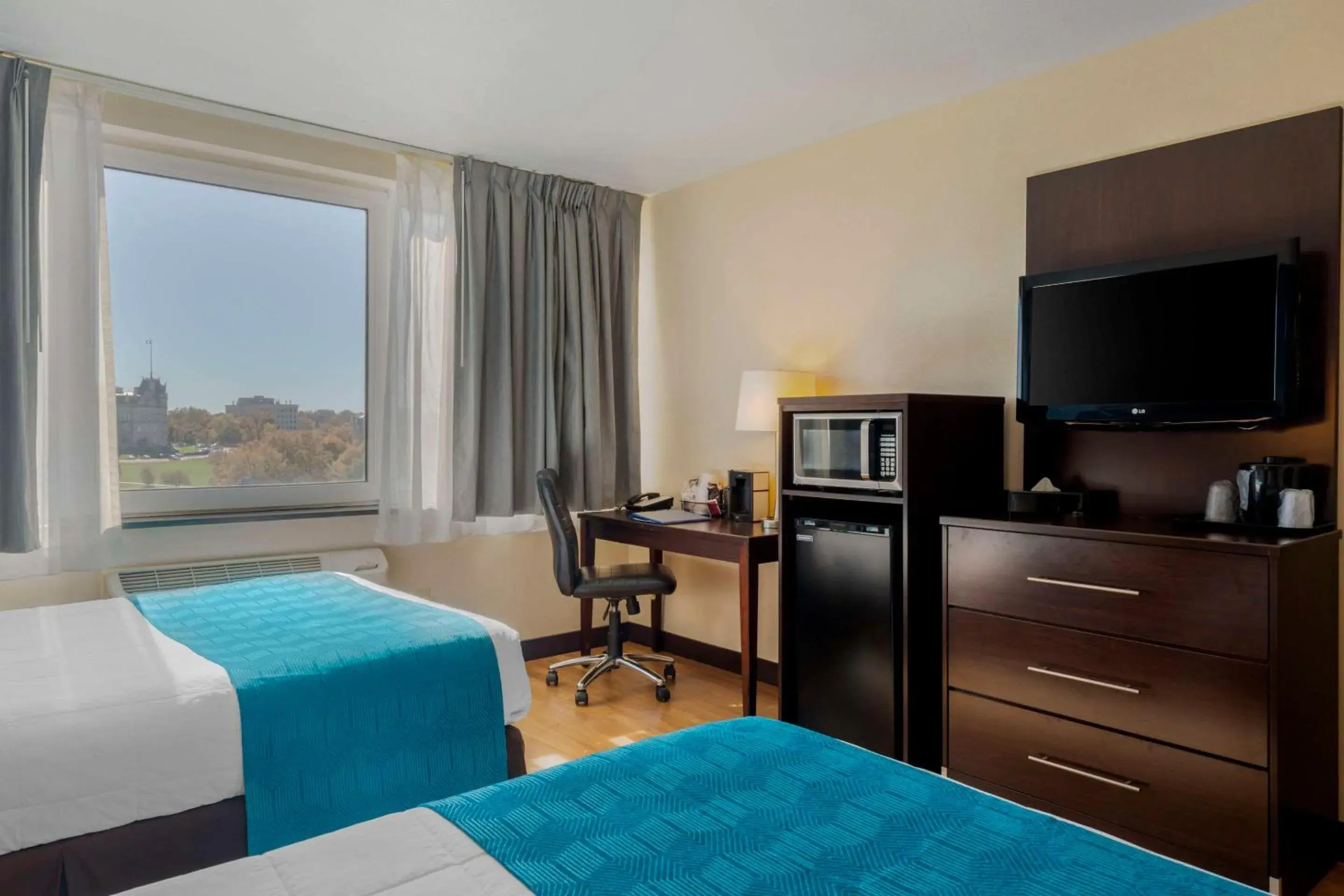 Premium Double Room with Two Double Beds - single occupancy - Non-Smoking in The Capitol Hotel Premium Double Room with Two Double Beds - single occupancy - Non-Smoking in The Capitol Hotel