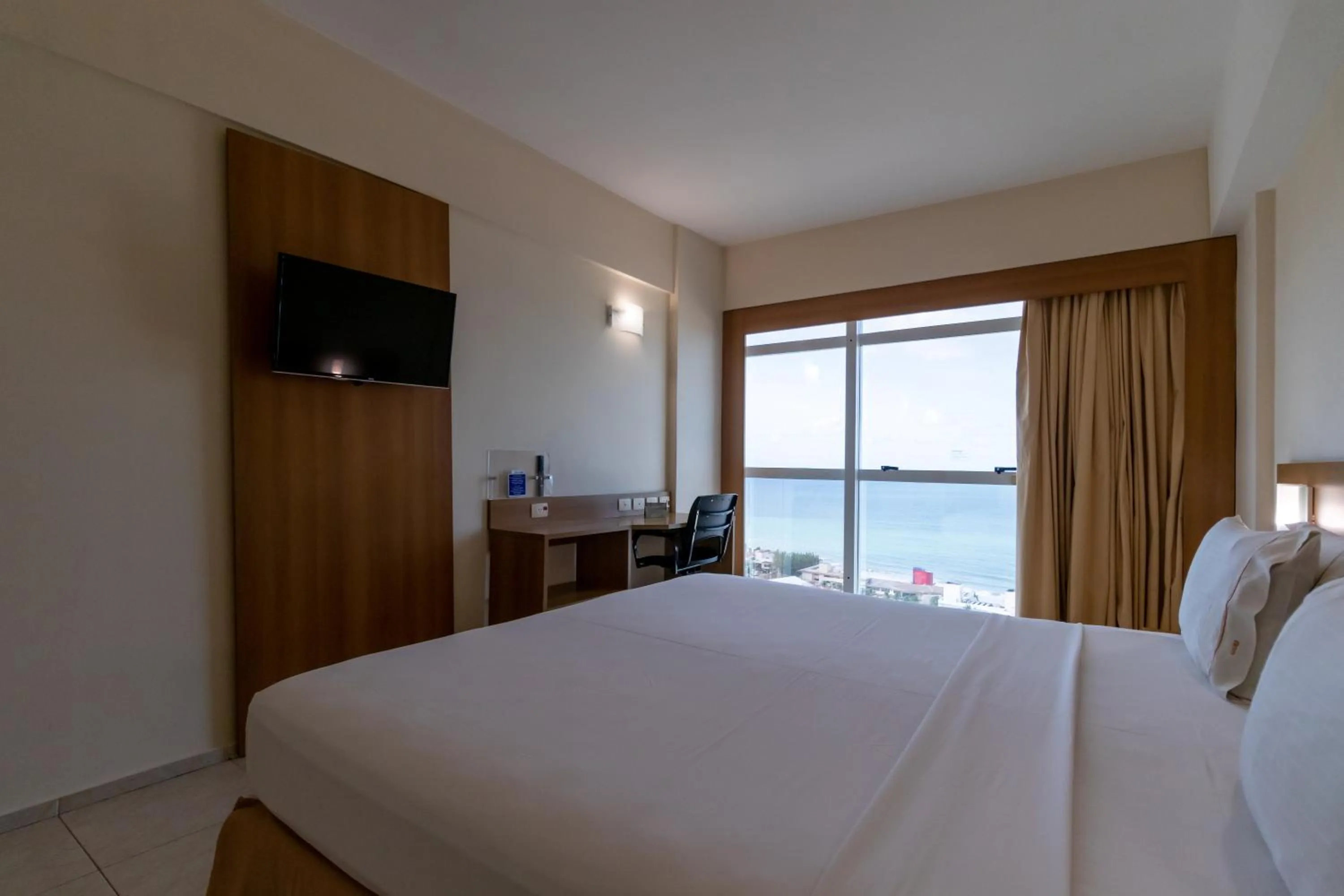 Bed in Praiamar Express Hotel