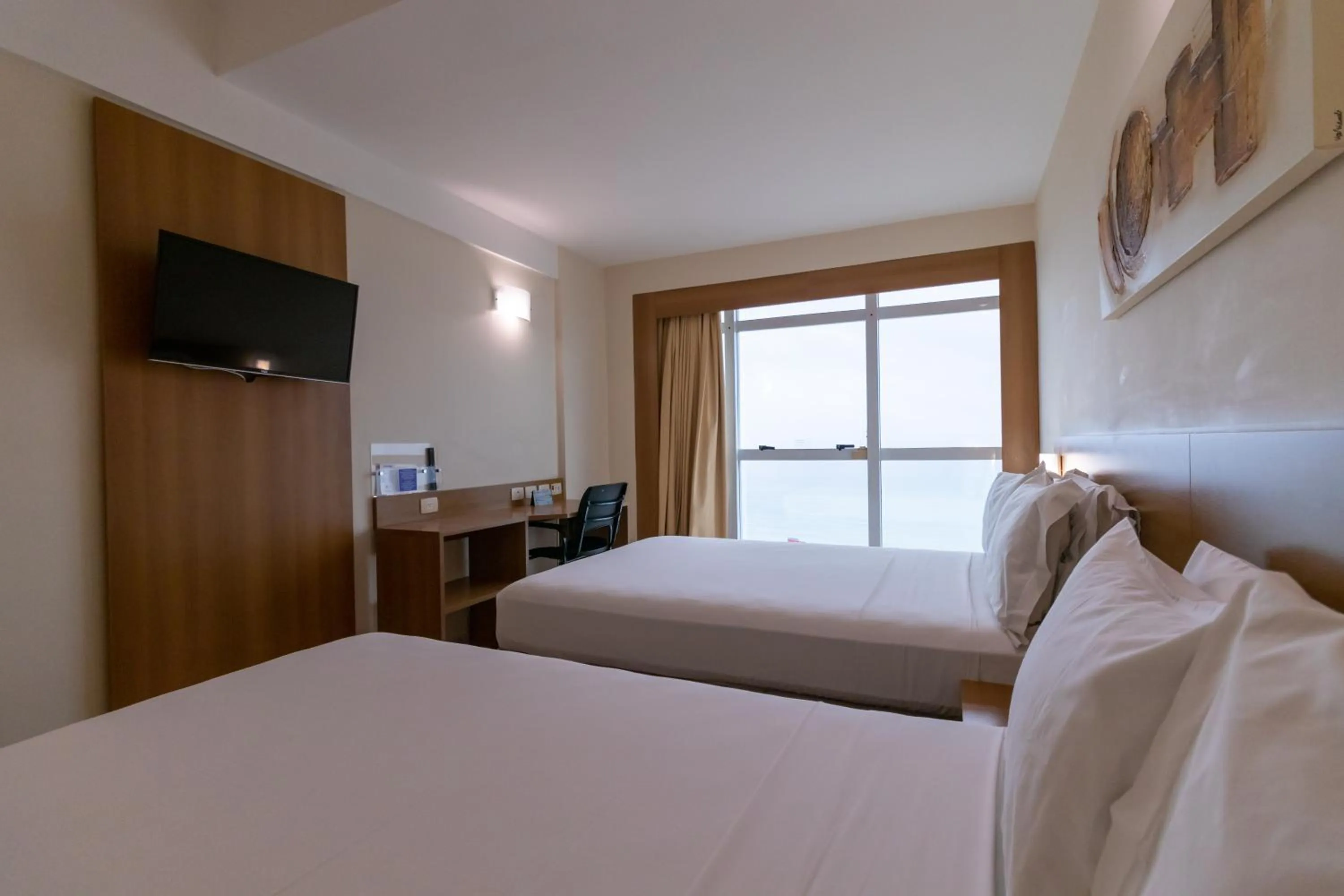 Bed in Praiamar Express Hotel