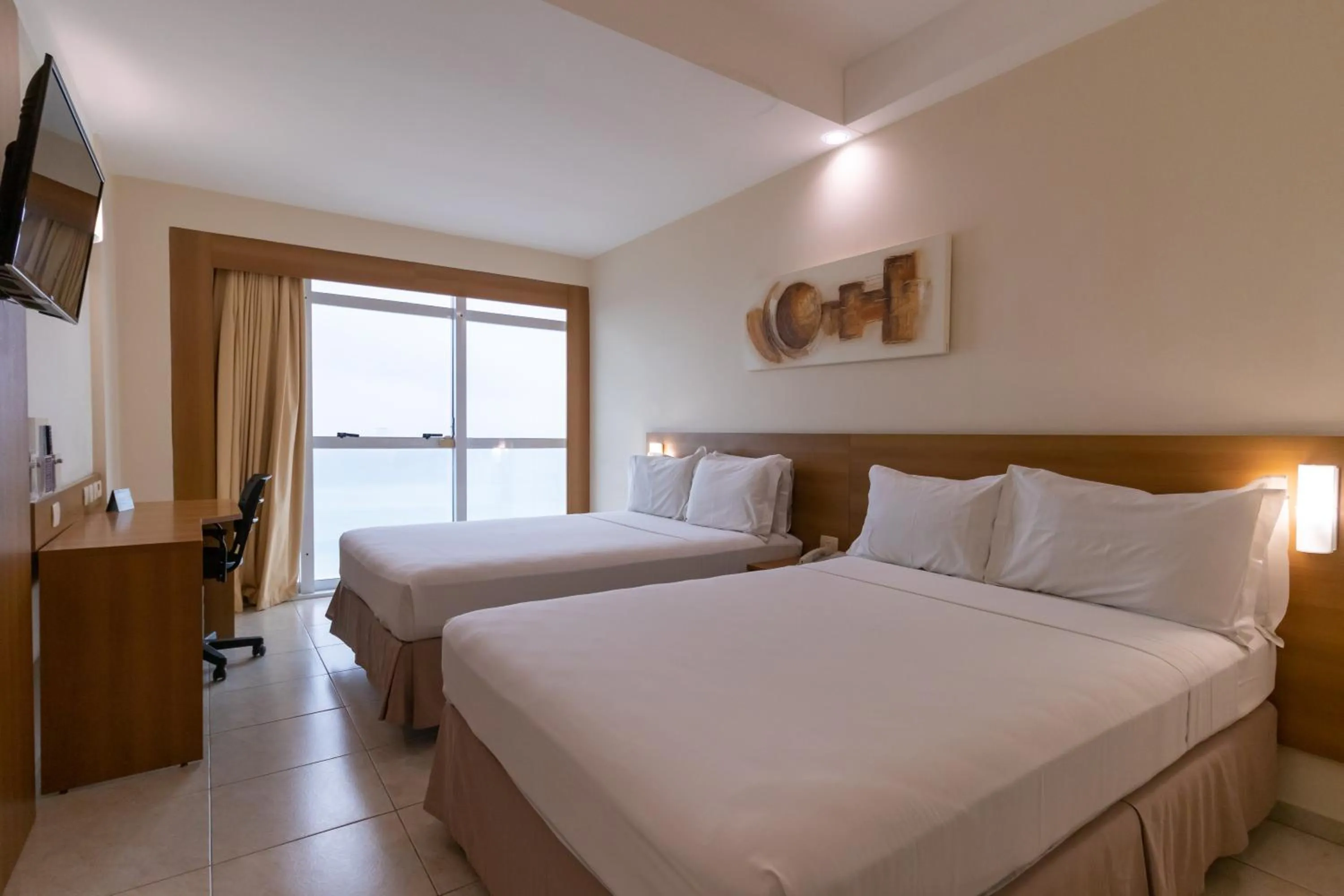 Bed in Praiamar Express Hotel