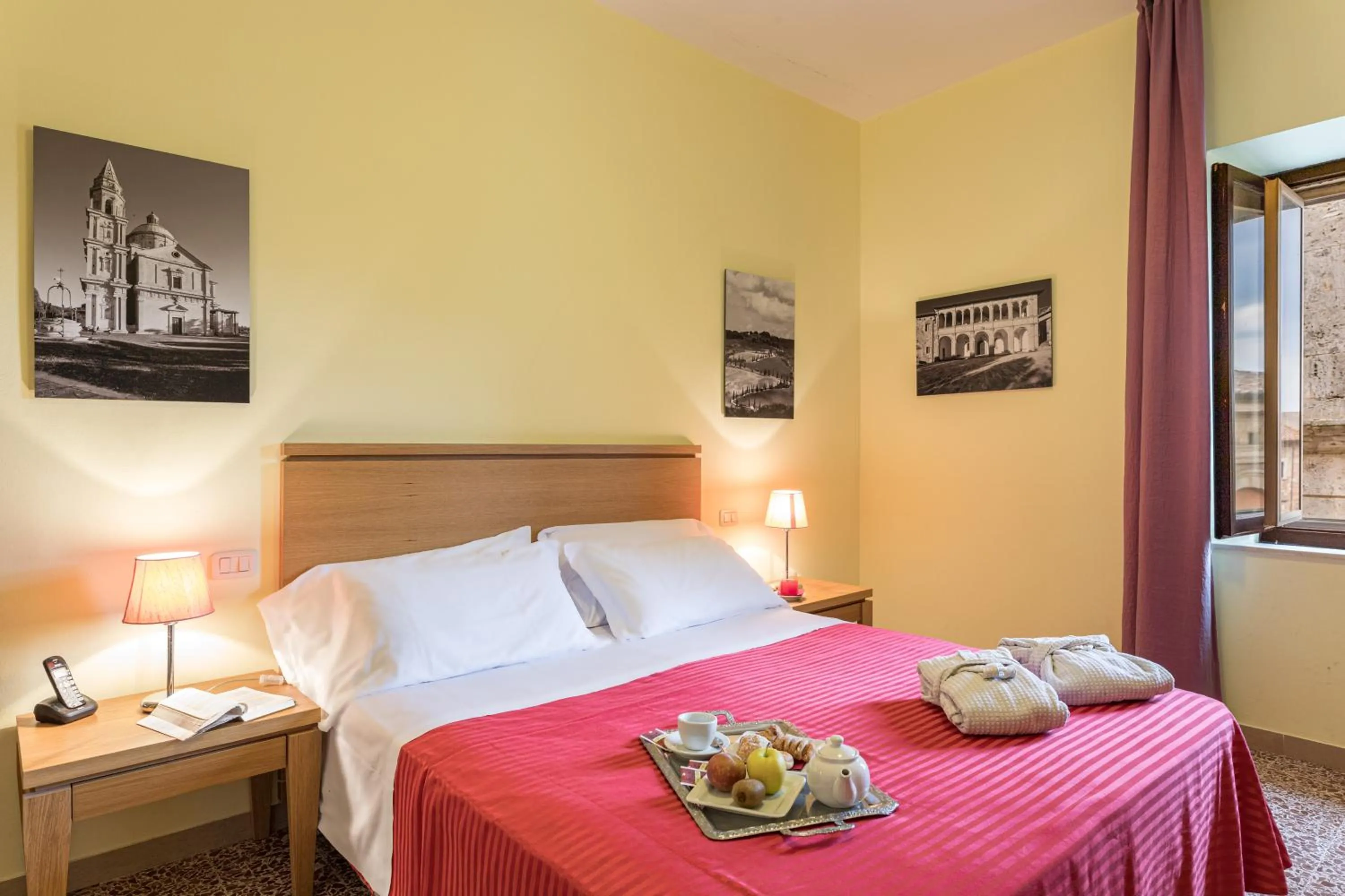 Photo of the whole room, Bed in Bellarmino Boutique Apartments, Montepulciano