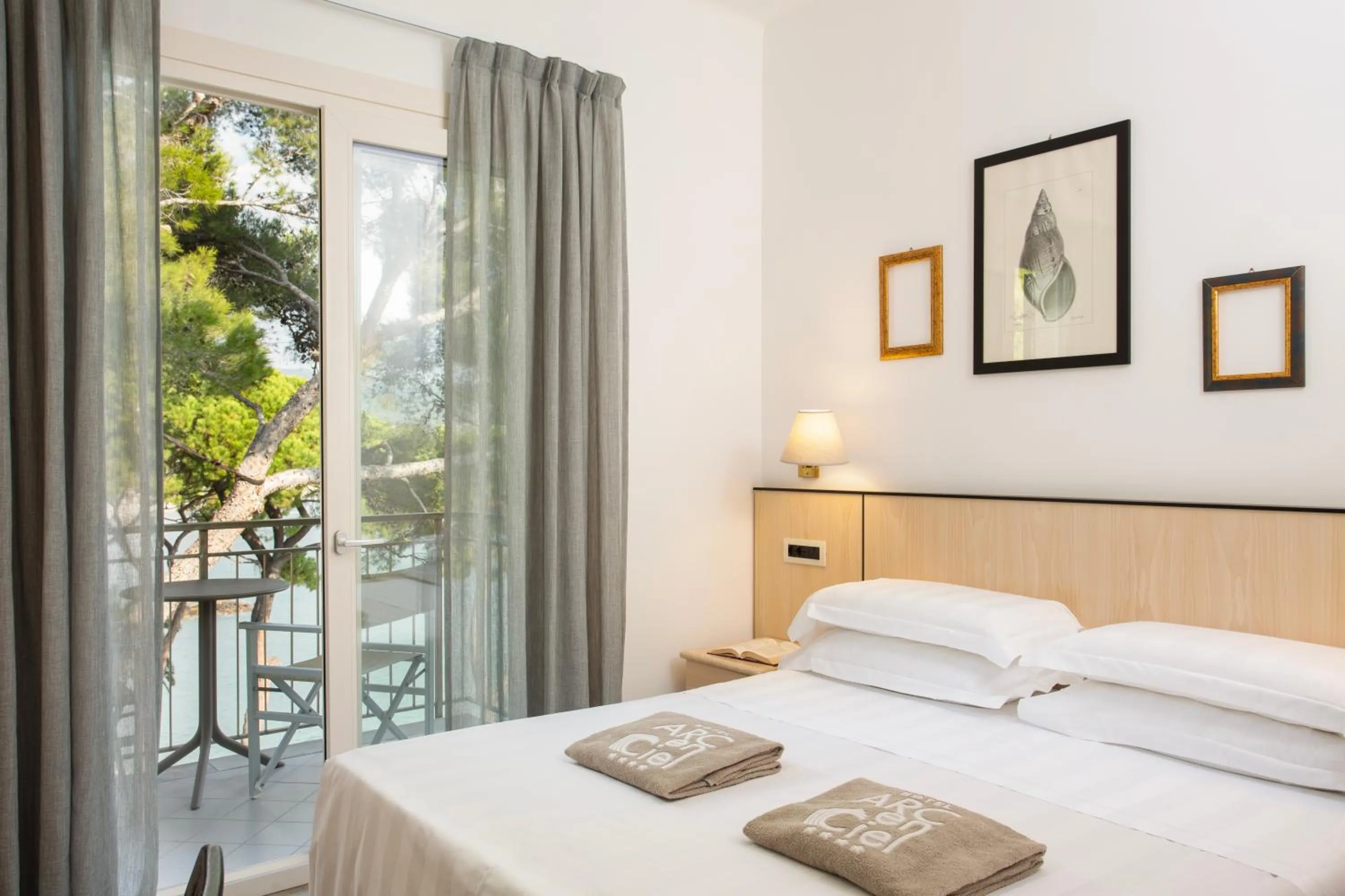 Bed in Hotel Arc En Ciel