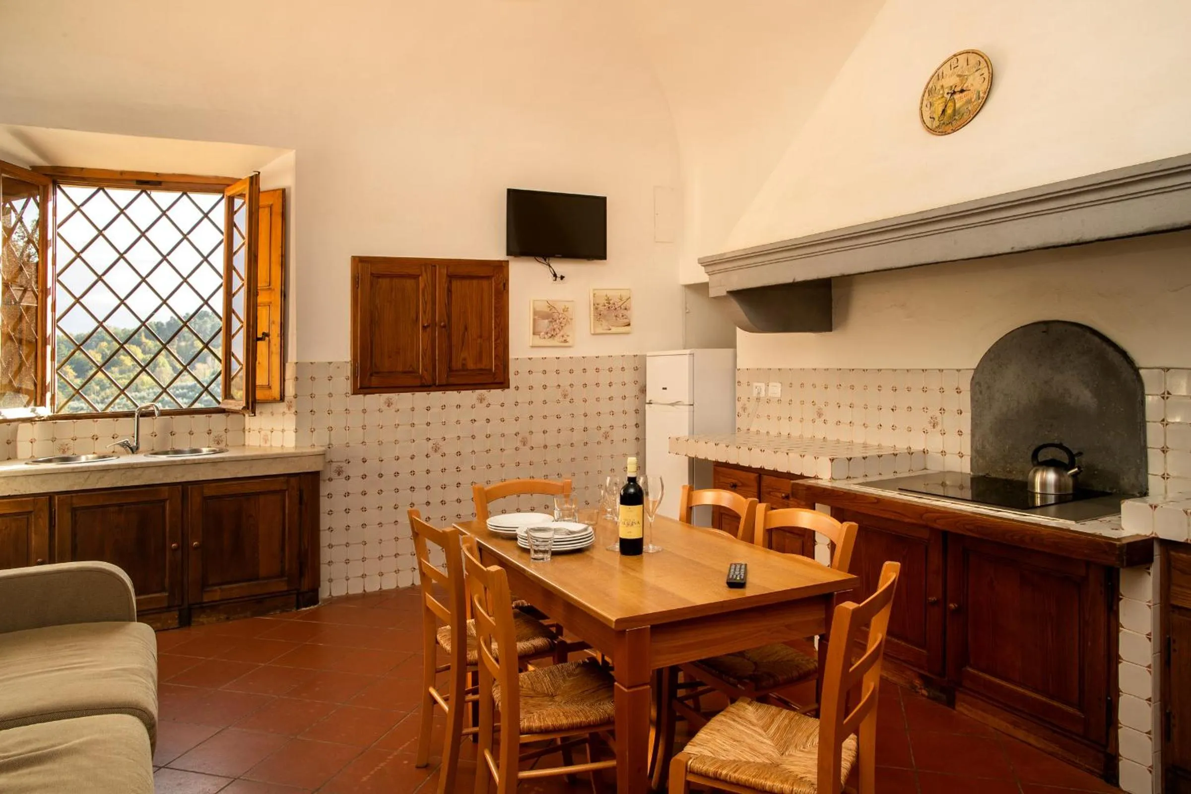 Kitchen or kitchenette in hu Norcenni Girasole village
