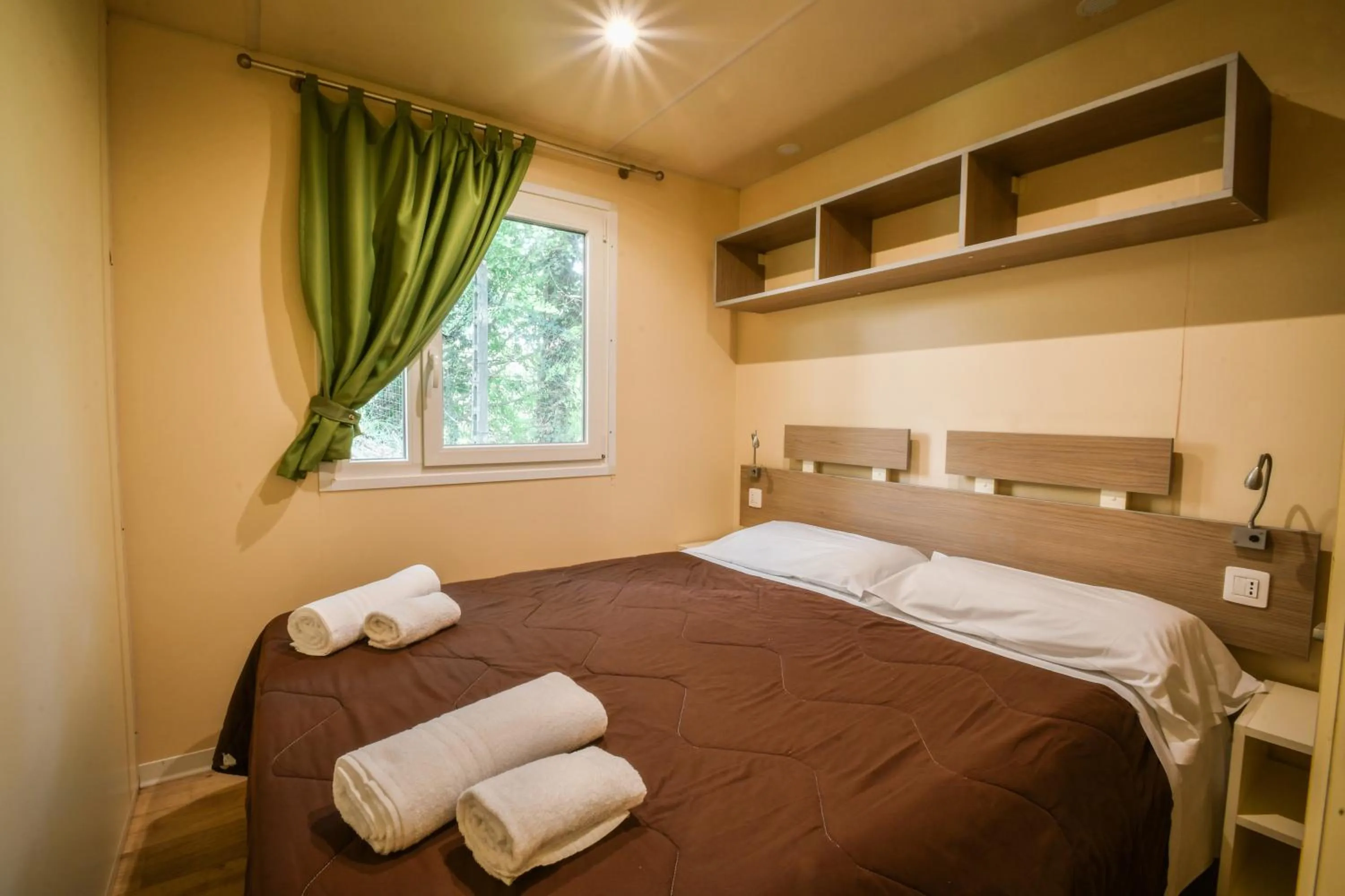 Bedroom, Bed in hu Norcenni Girasole village