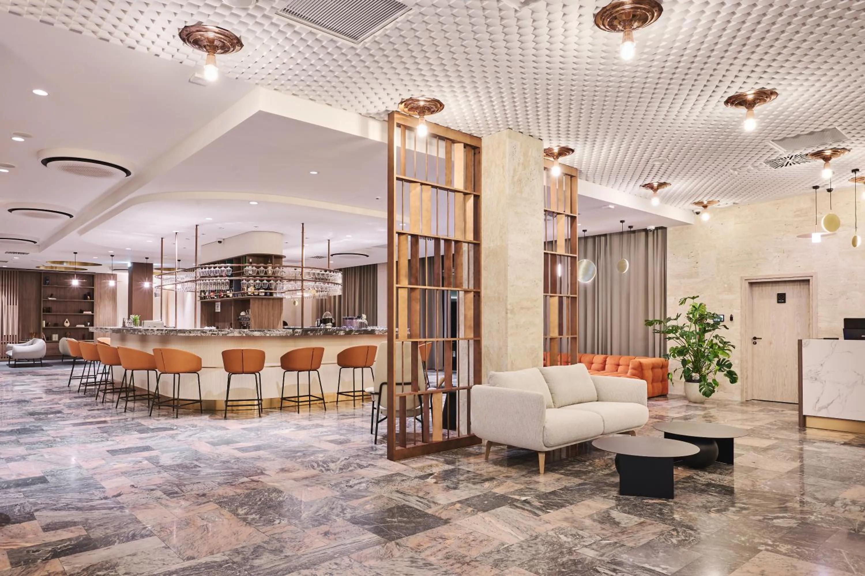 Lobby or reception in voco Katowice by IHG