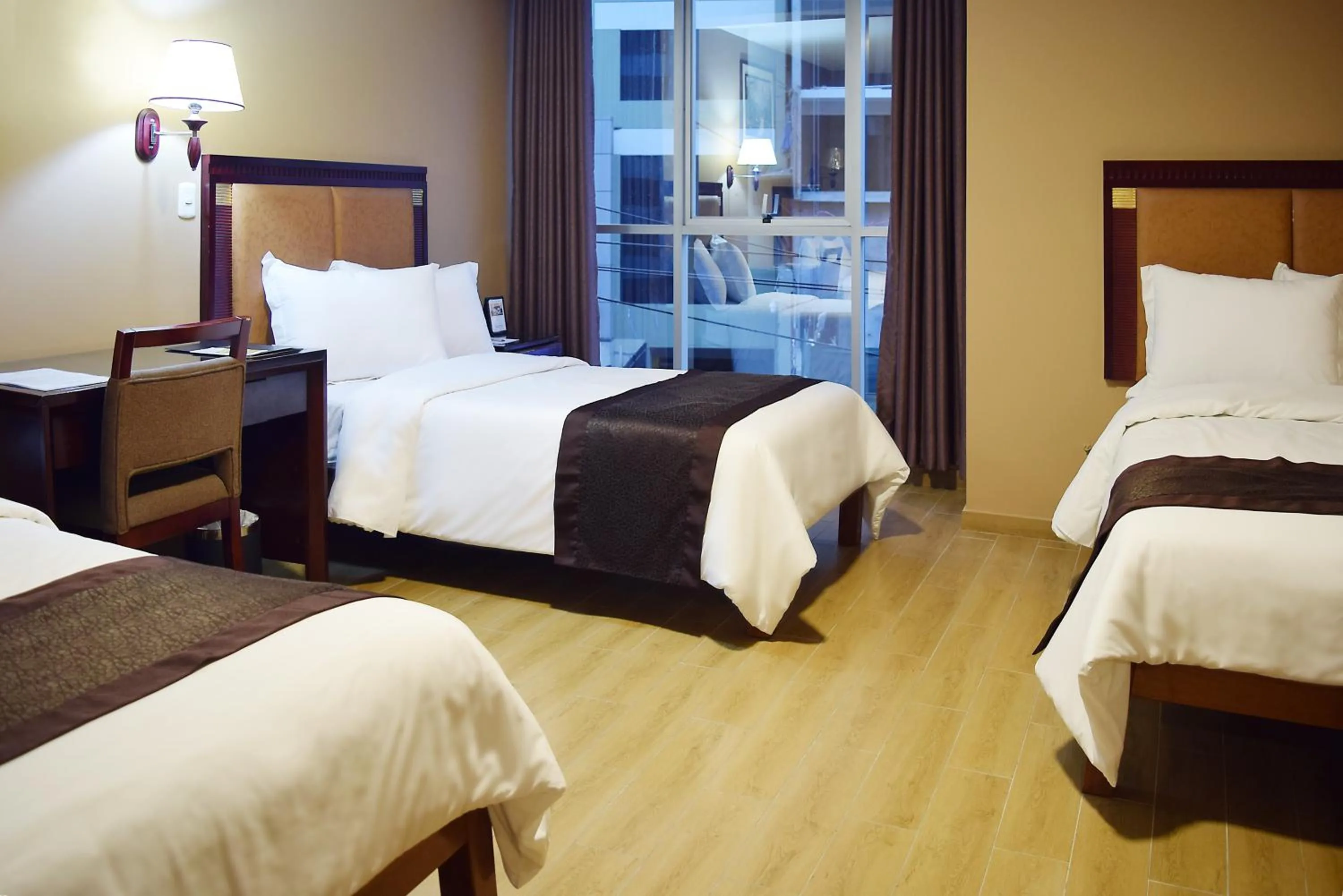 Photo of the whole room, Bed in Gran Mundo Hotel & Suites