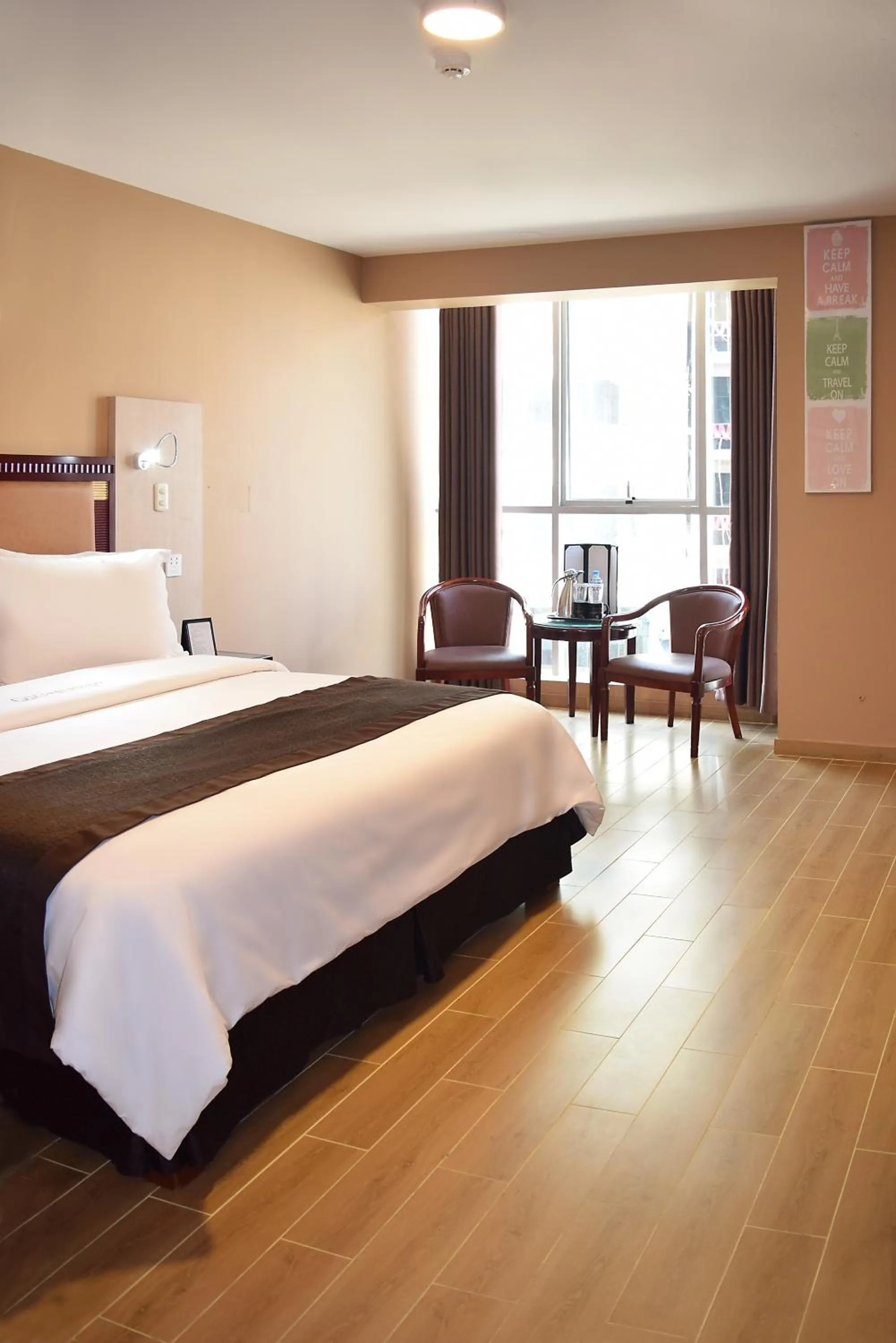 Photo of the whole room, Bed in Gran Mundo Hotel & Suites