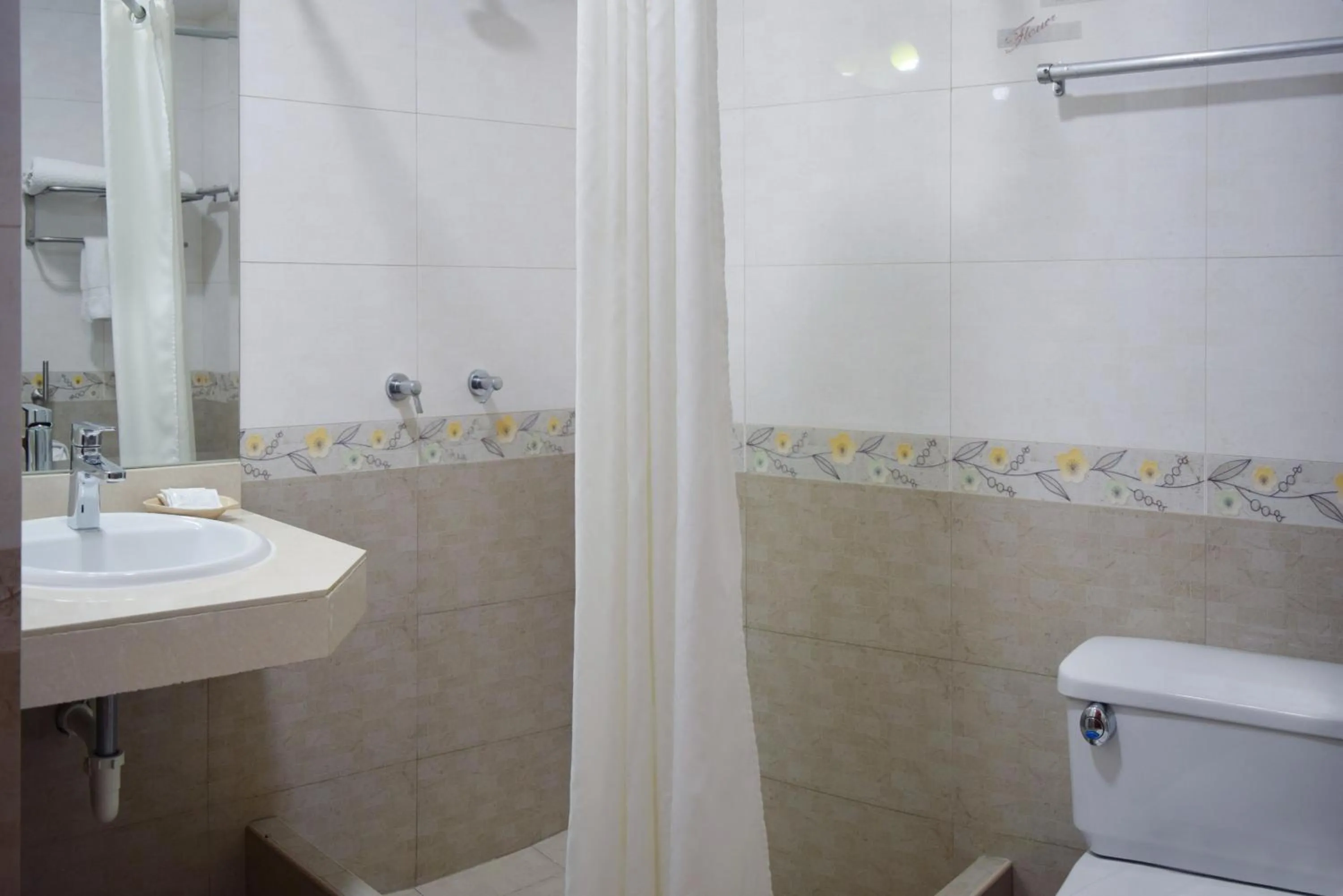 Bathroom in Gran Mundo Hotel & Suites