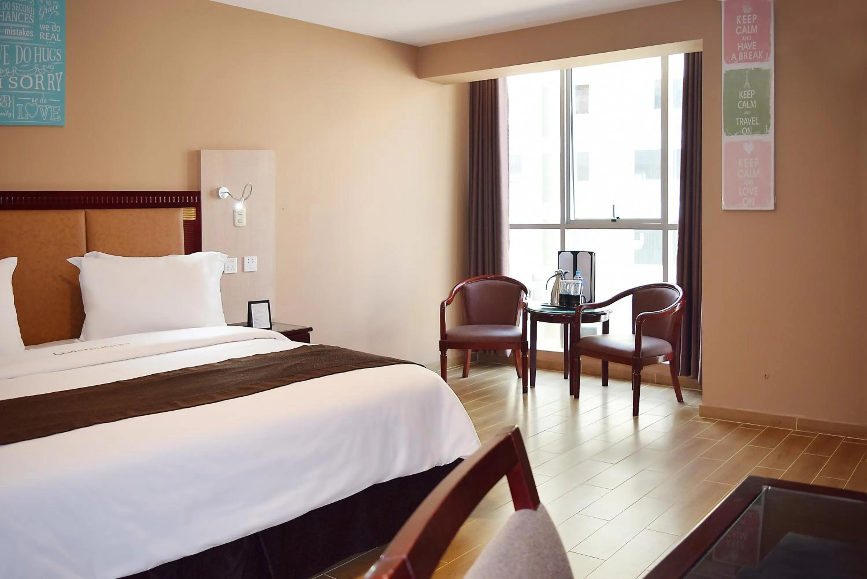 Photo of the whole room, Bed in Gran Mundo Hotel & Suites