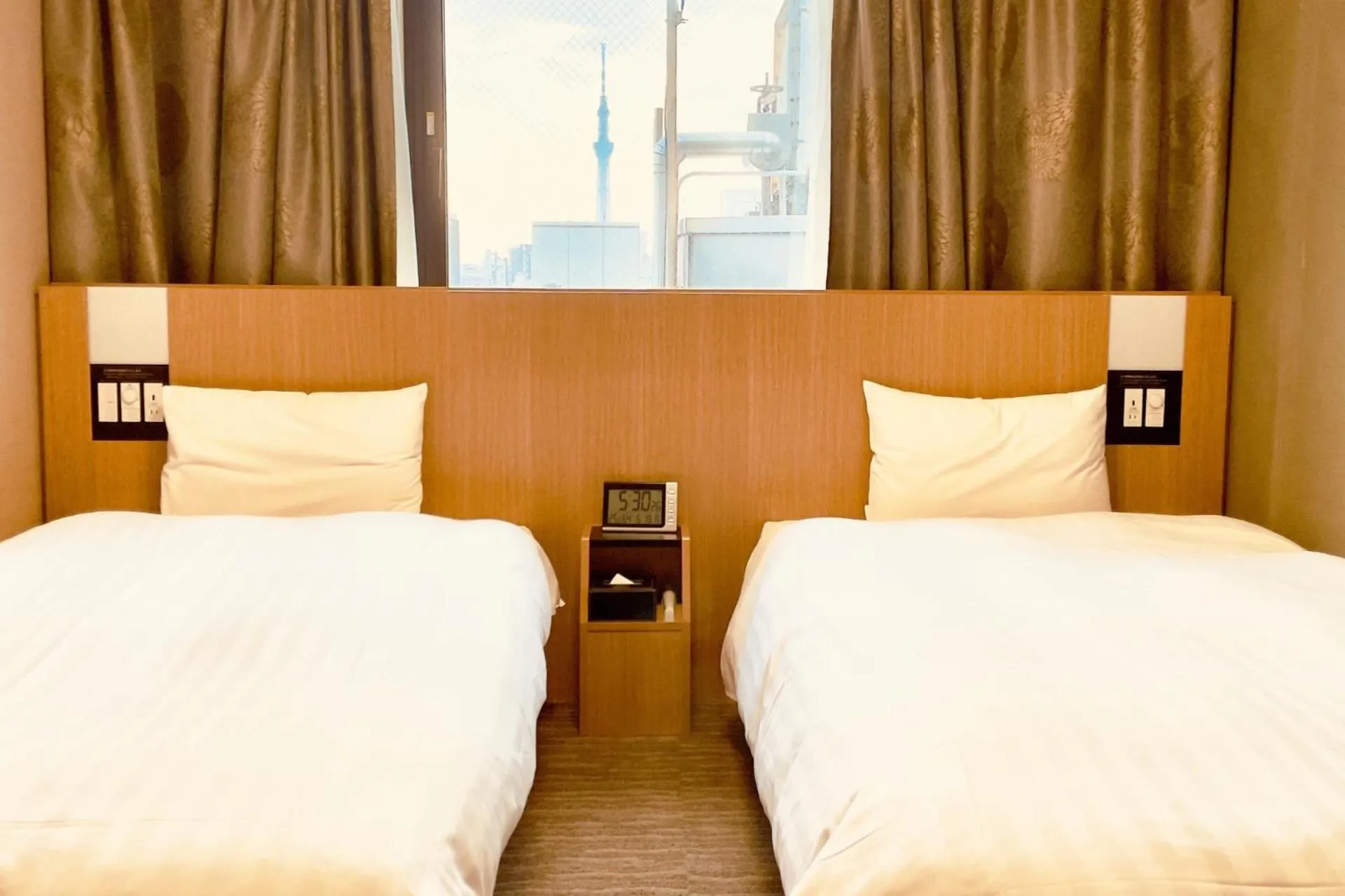 Bed in Dormy Inn Premium Tokyo Kodenmacho