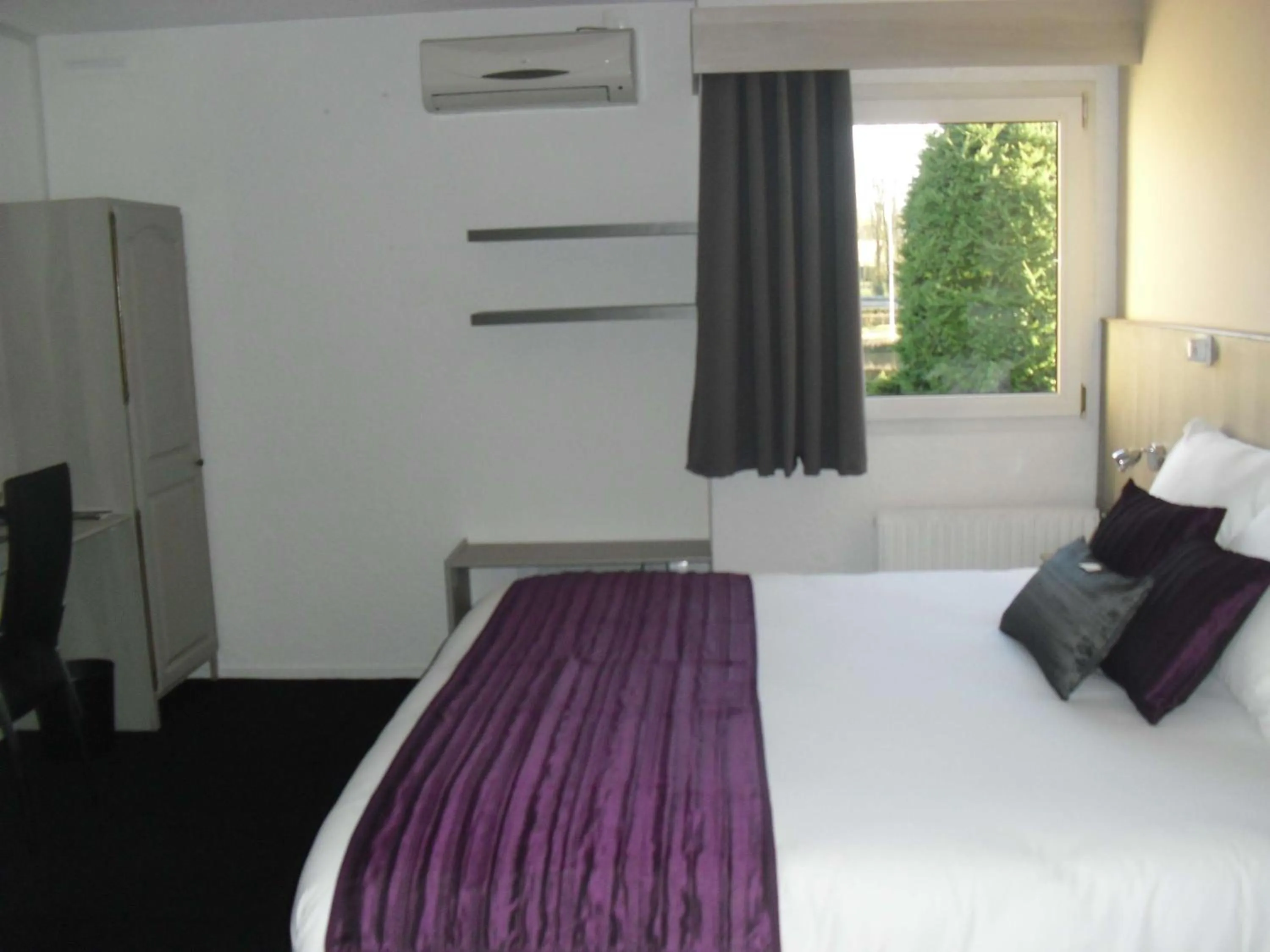 Bedroom, Bed in Brit Hotel Dak Hotel