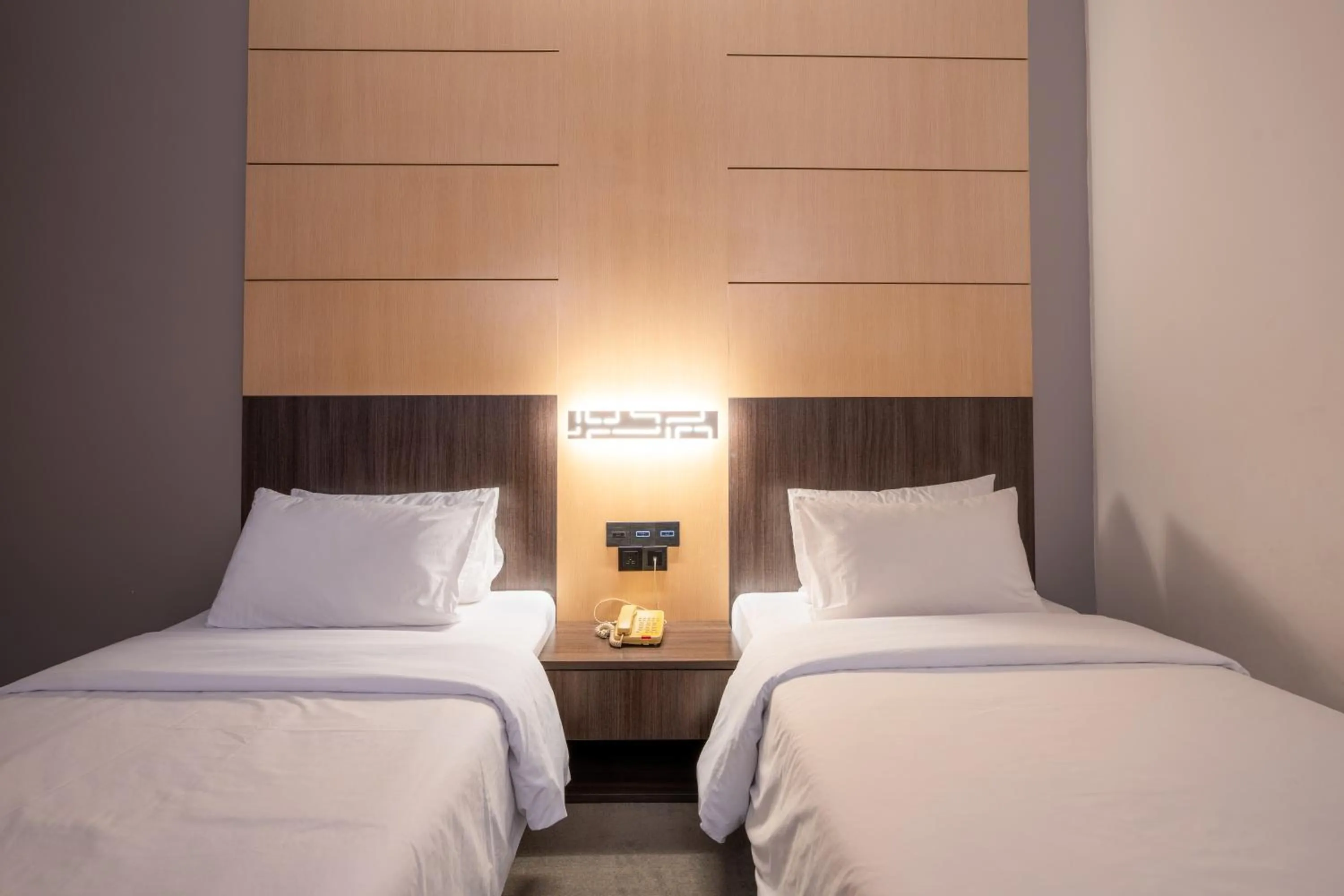 Bed in Ariston Hotel Bangkok