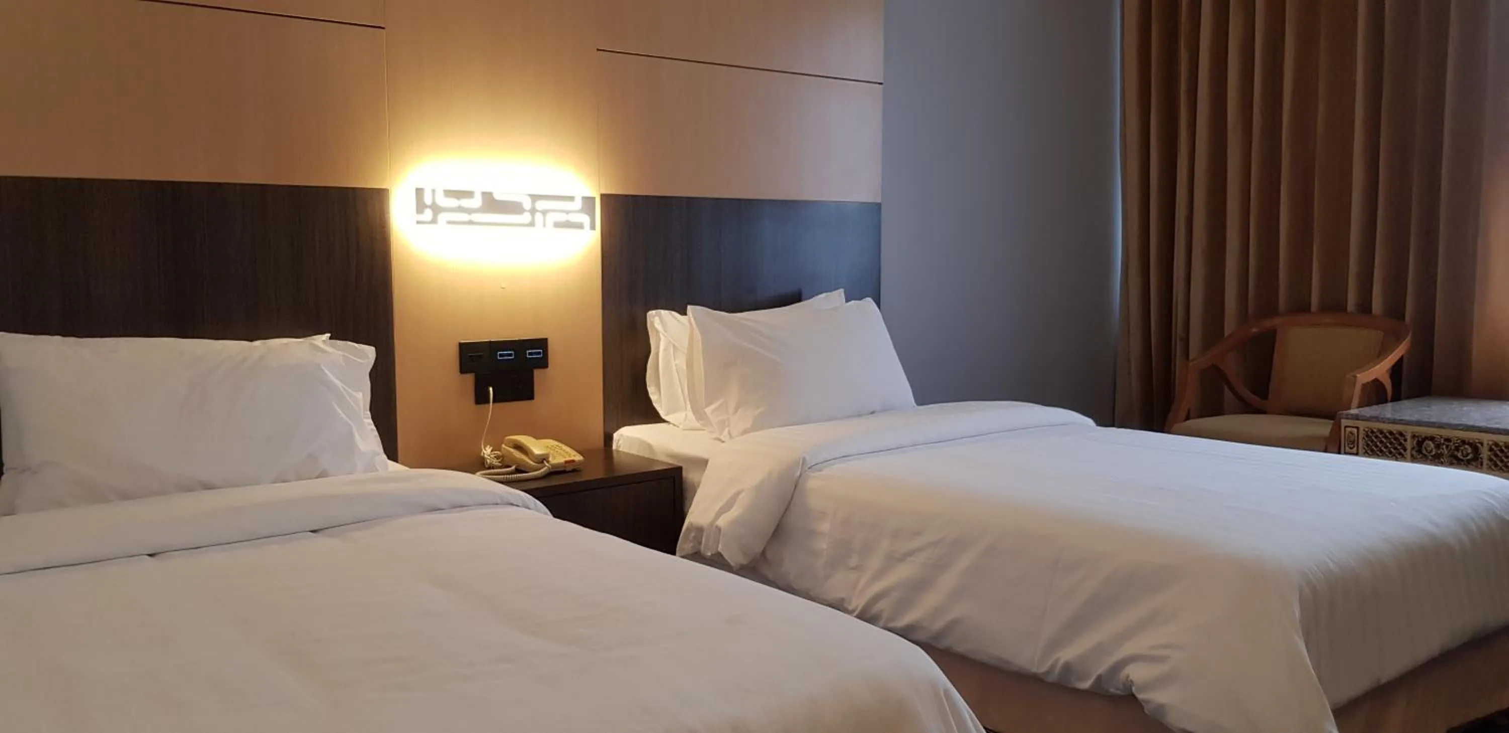 Bed in Ariston Hotel Bangkok
