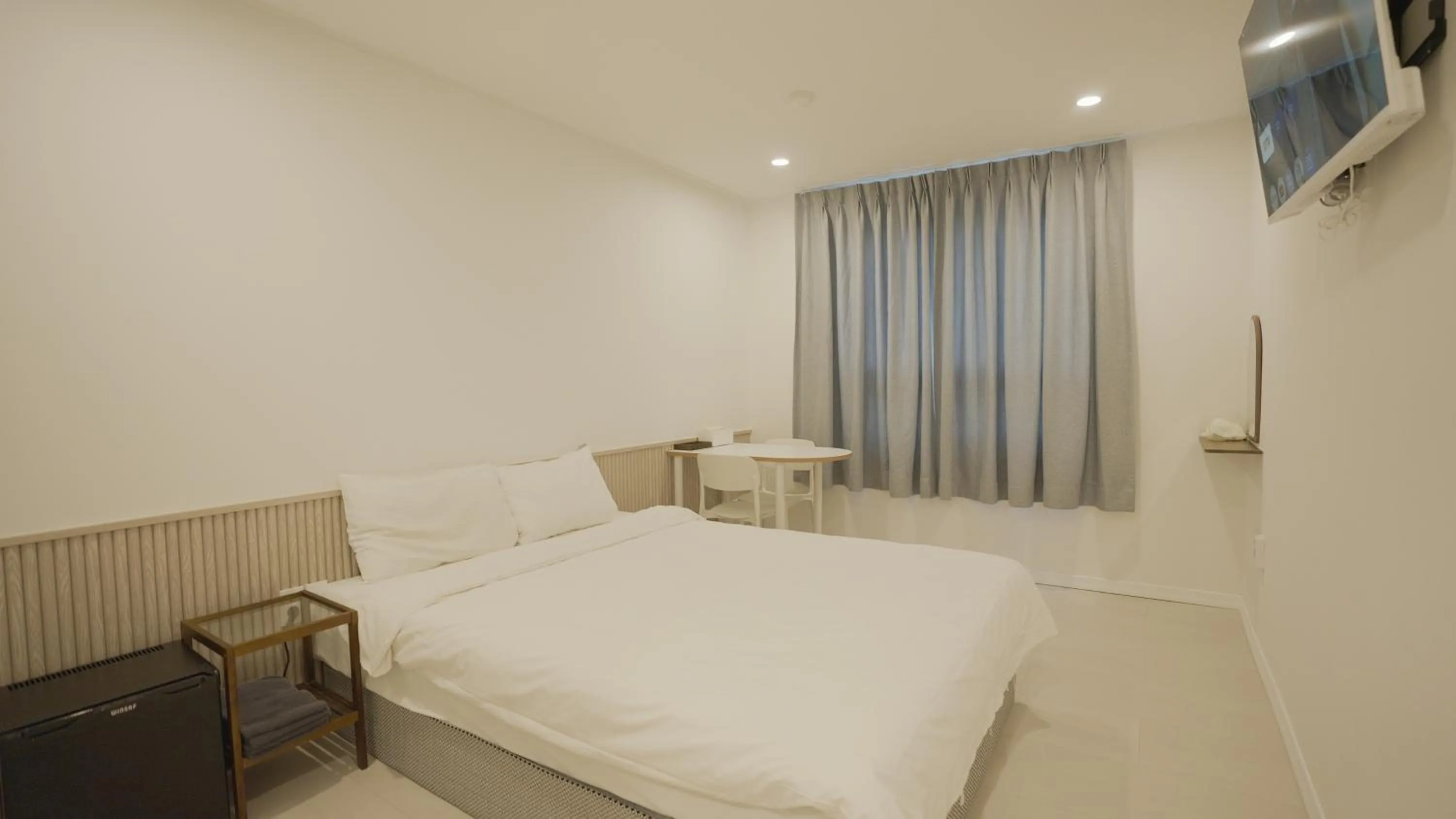 Bed in Jeju Stay Hotel