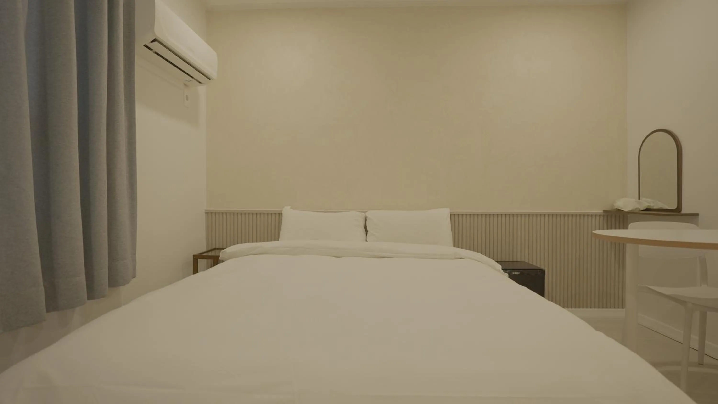 Bed in Jeju Stay Hotel